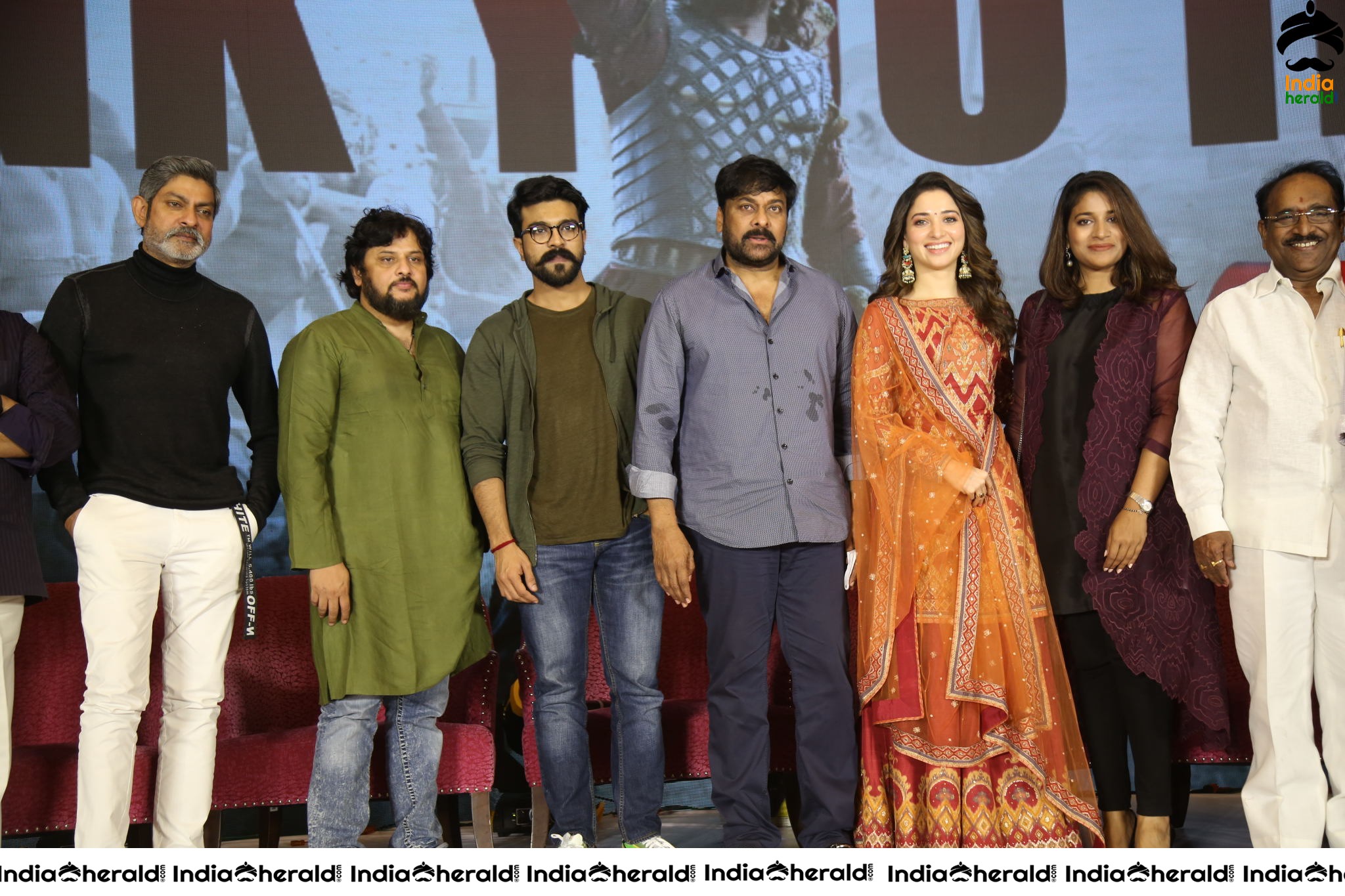 Chiranjeevi Tamanna and Ram Charan from the stage of Sye Raa Thank You Meet Set 3