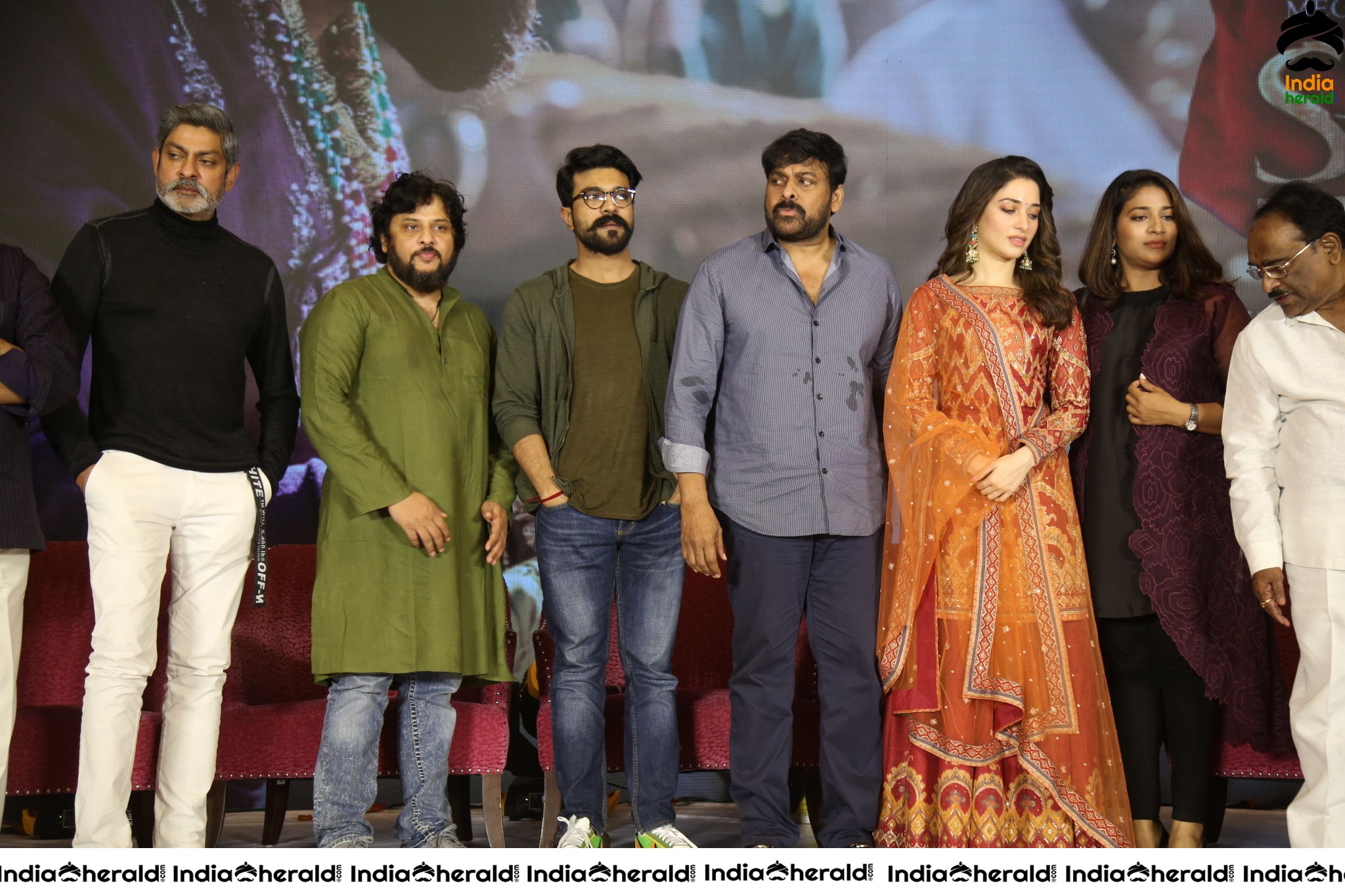 Chiranjeevi Tamanna and Ram Charan from the stage of Sye Raa Thank You Meet Set 3