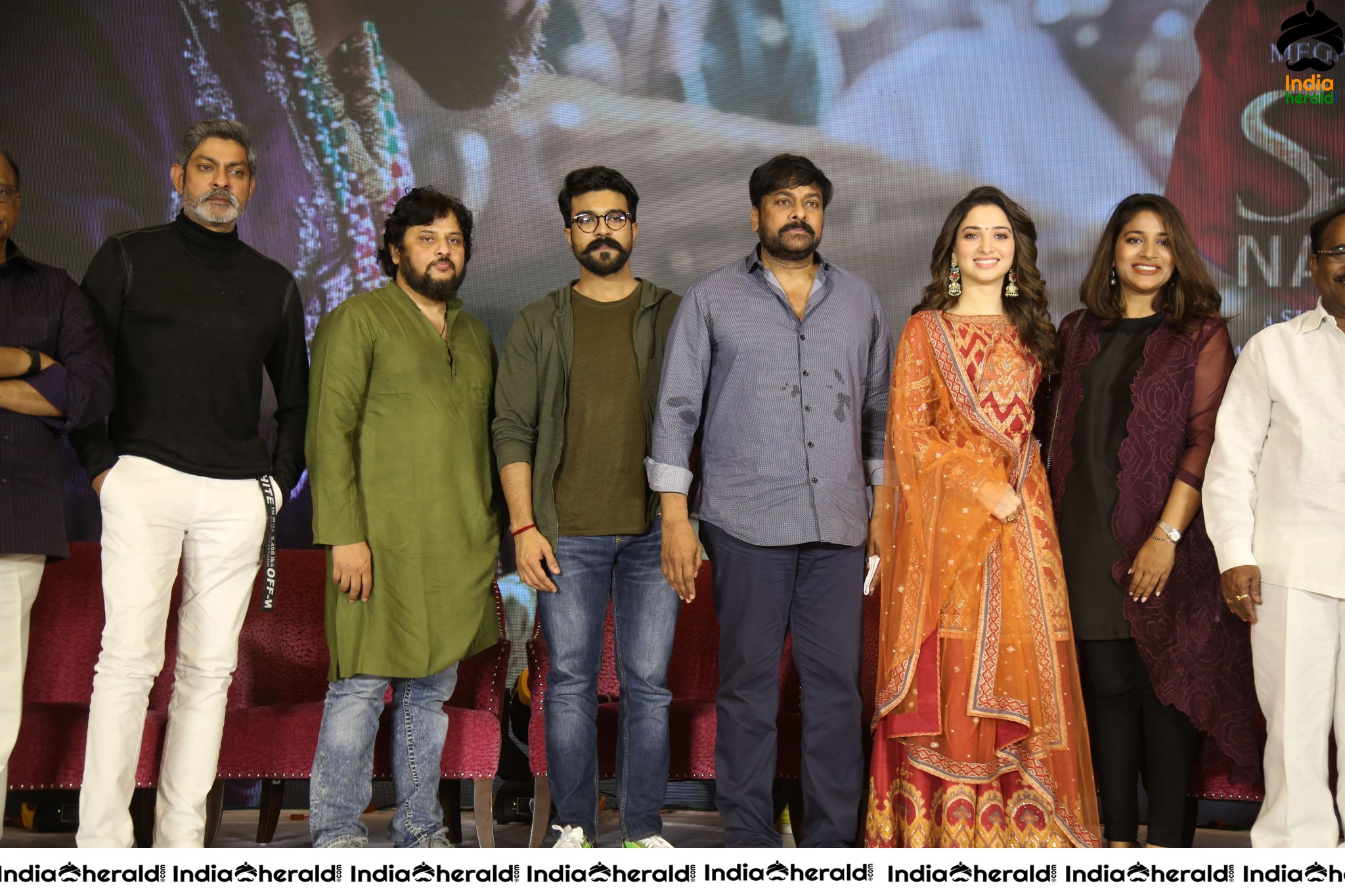 Chiranjeevi Tamanna and Ram Charan from the stage of Sye Raa Thank You Meet Set 3