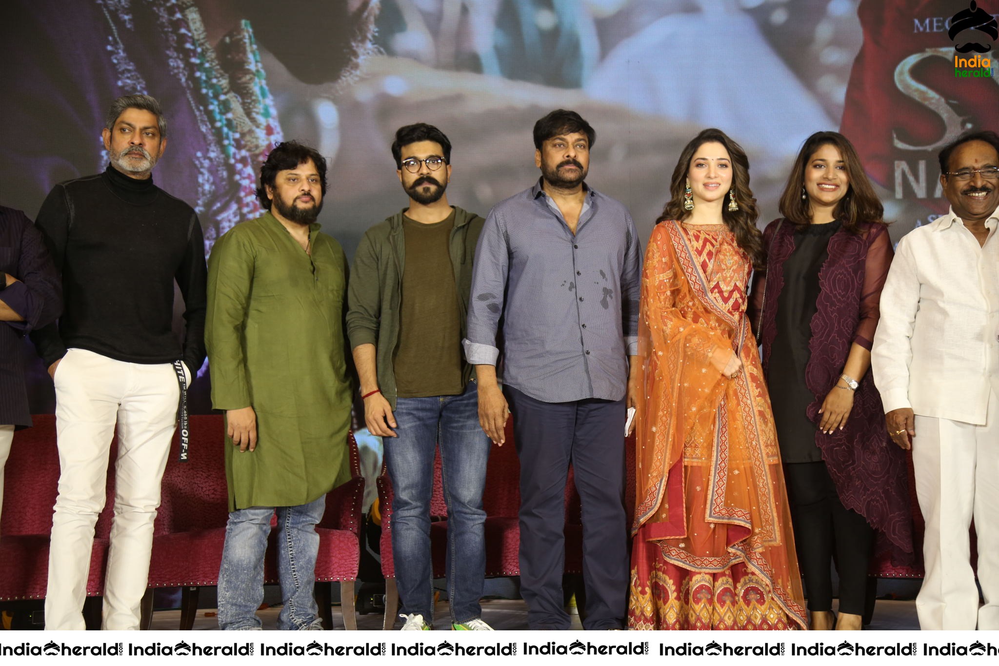 Chiranjeevi Tamanna and Ram Charan from the stage of Sye Raa Thank You Meet Set 3