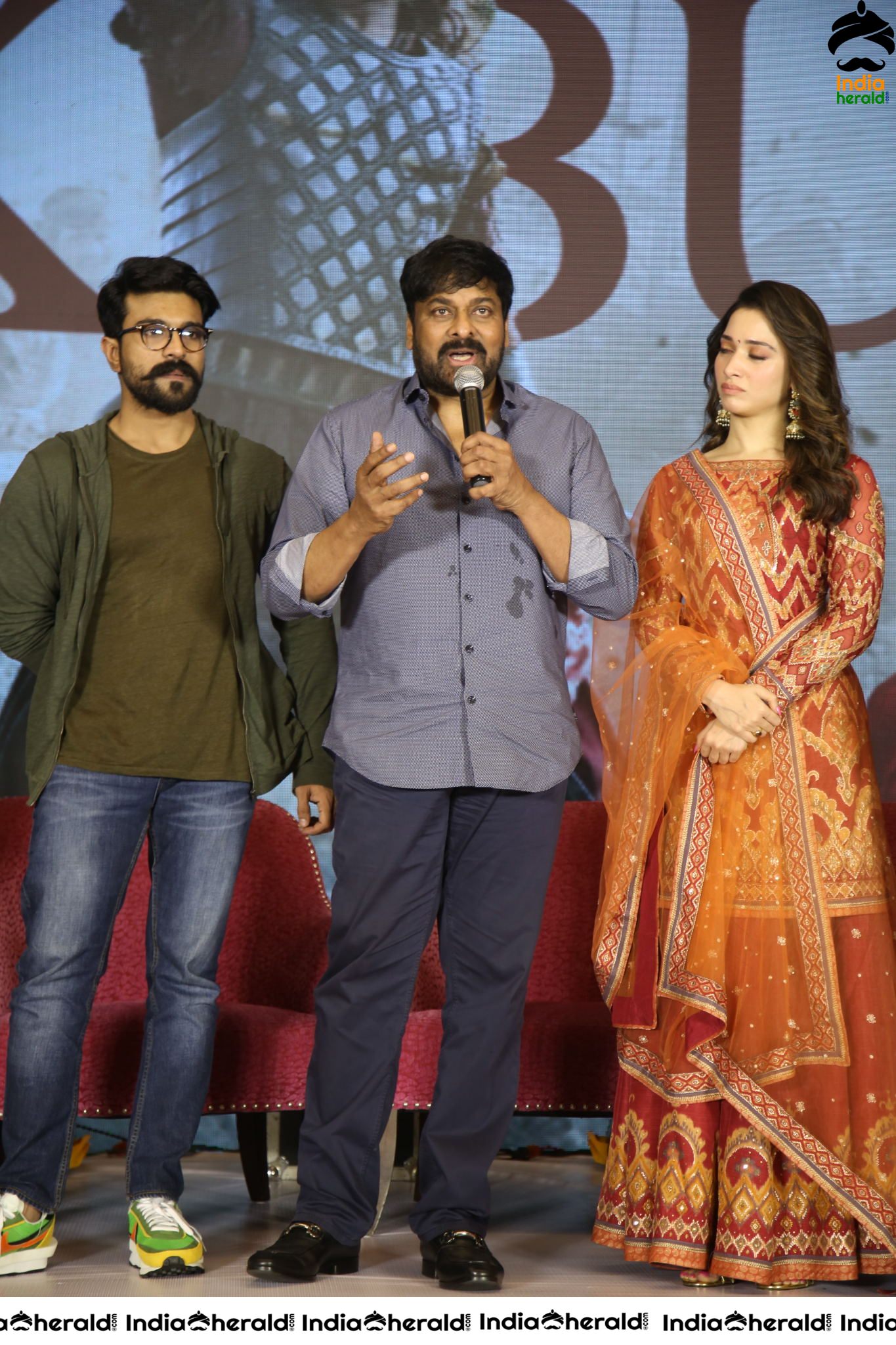 Chiranjeevi Tamanna and Ram Charan from the stage of Sye Raa Thank You Meet Set 3