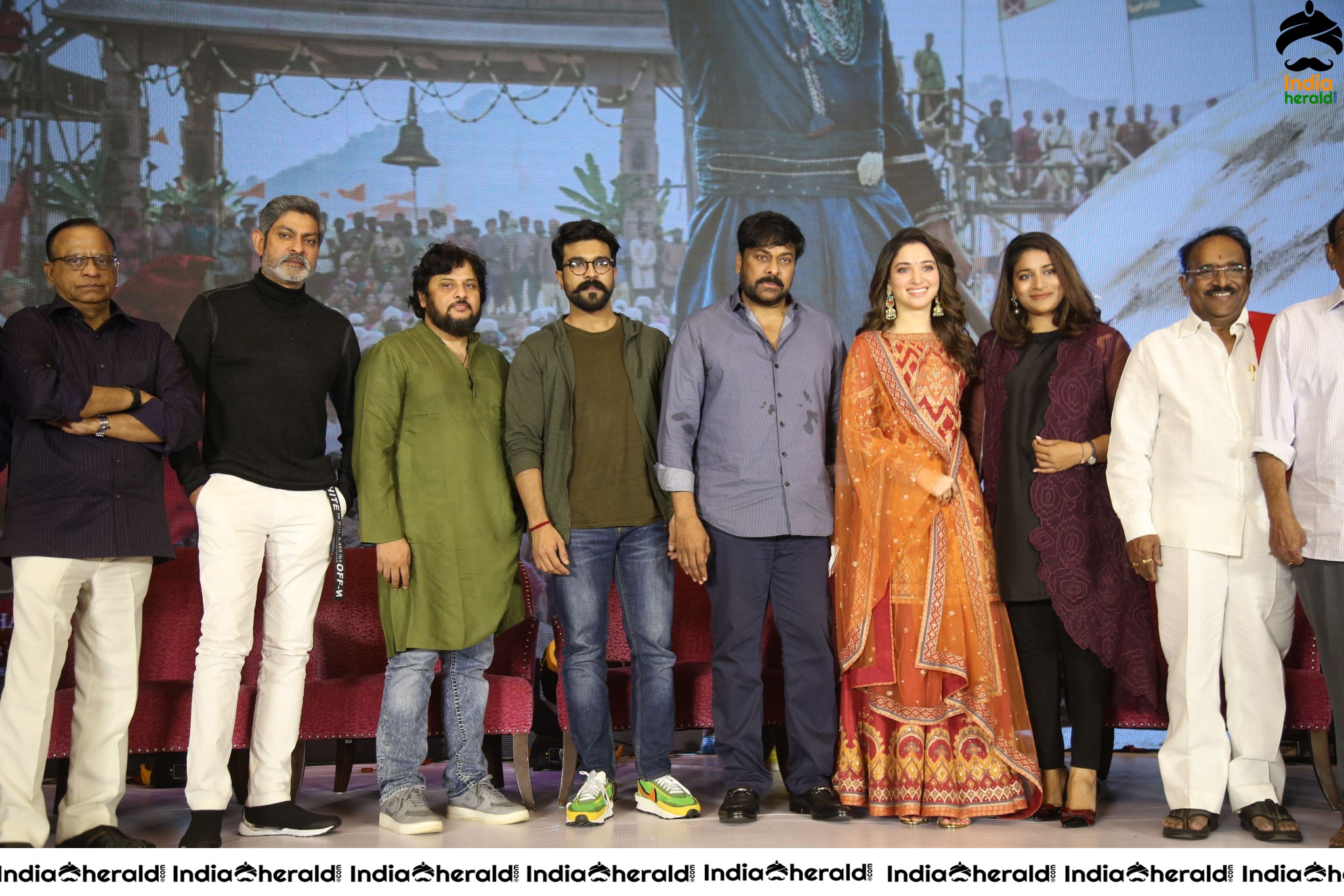 Chiranjeevi Tamanna and Ram Charan from the stage of Sye Raa Thank You Meet Set 4