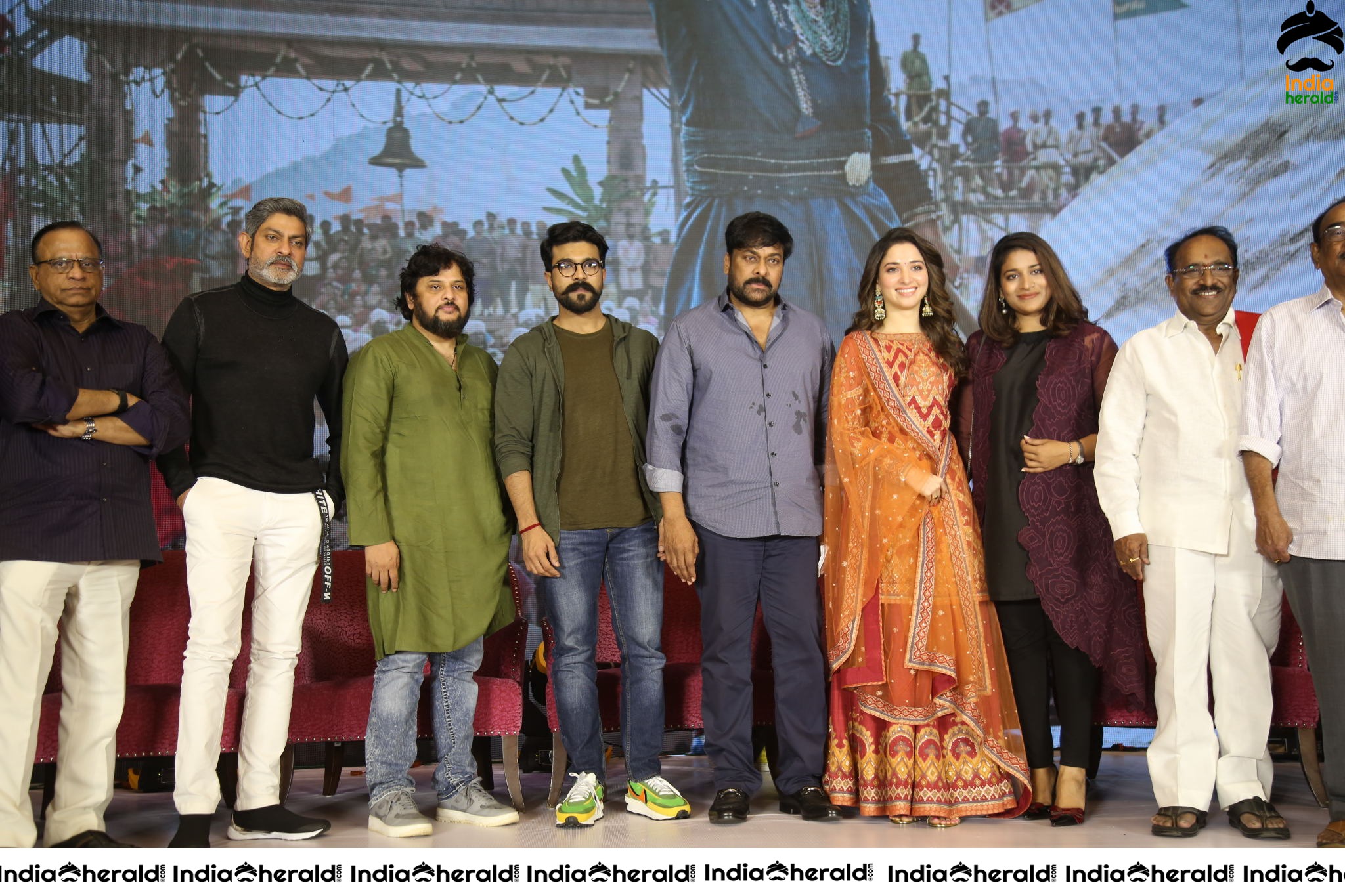 Chiranjeevi Tamanna and Ram Charan from the stage of Sye Raa Thank You Meet Set 5