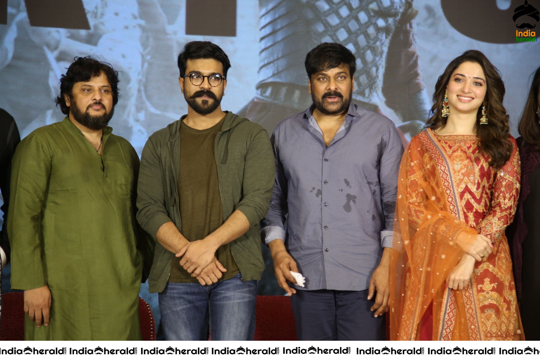 Chiranjeevi Tamanna and Ram Charan from the stage of Sye Raa Thank You Meet Set 5