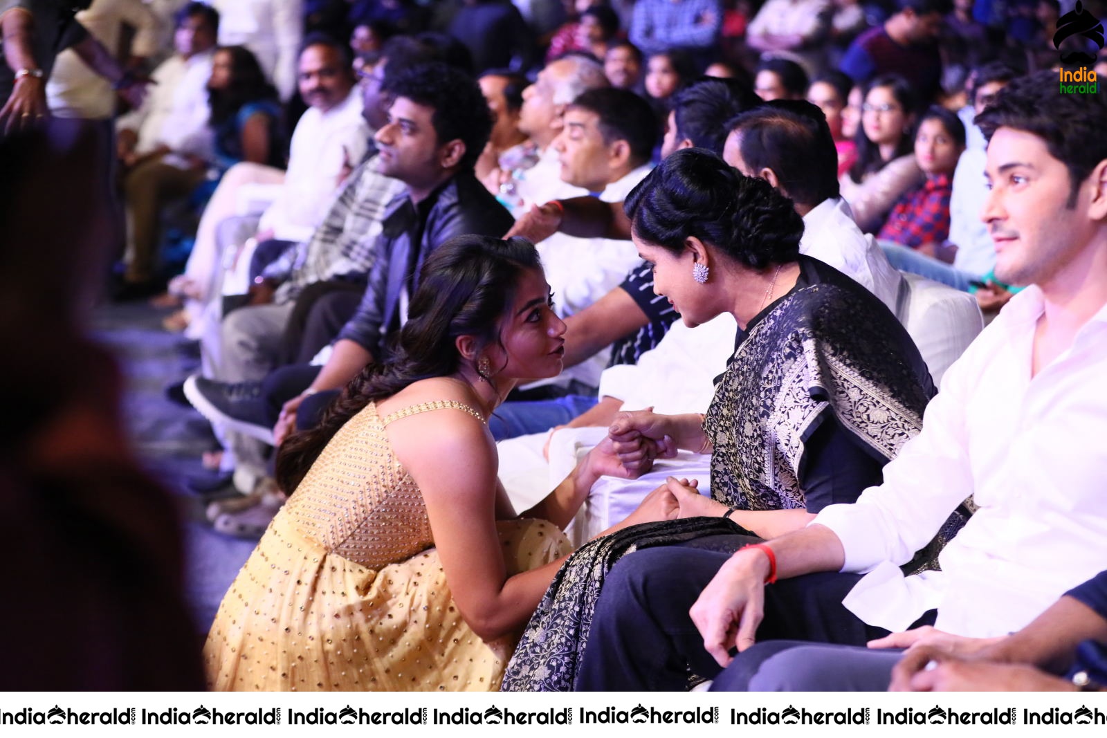 Cute Rashmika Kneels and Chats with Chiranjeevi and Vijayashanthi at the event