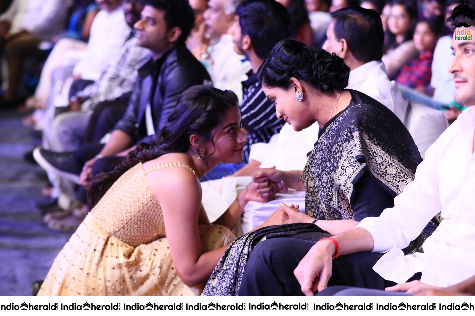 Cute Rashmika Kneels and Chats with Chiranjeevi and Vijayashanthi at the event