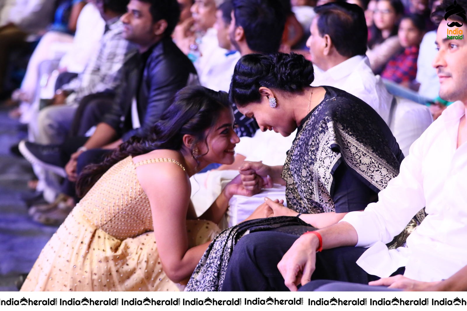 Cute Rashmika Kneels and Chats with Chiranjeevi and Vijayashanthi at the event