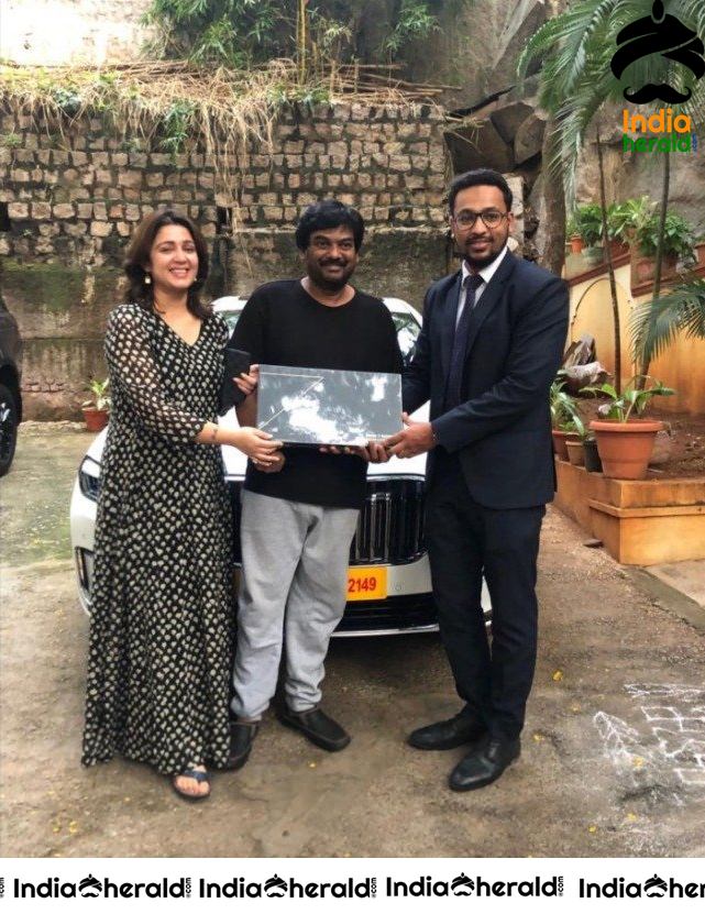Director Puri Jagannadh And Actress Charmee Buys BMW 7 Series