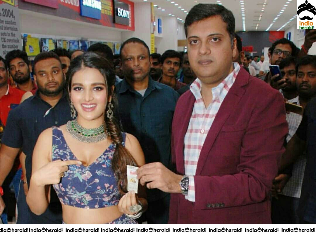 Hot Chick Nidhhi Agerwal At Bajaj Electronics In Sujana Forum Mall