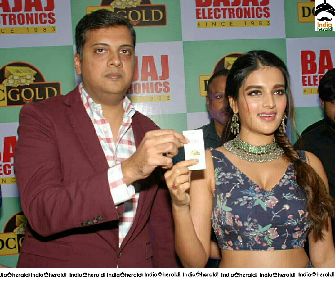 Hot Chick Nidhhi Agerwal At Bajaj Electronics In Sujana Forum Mall