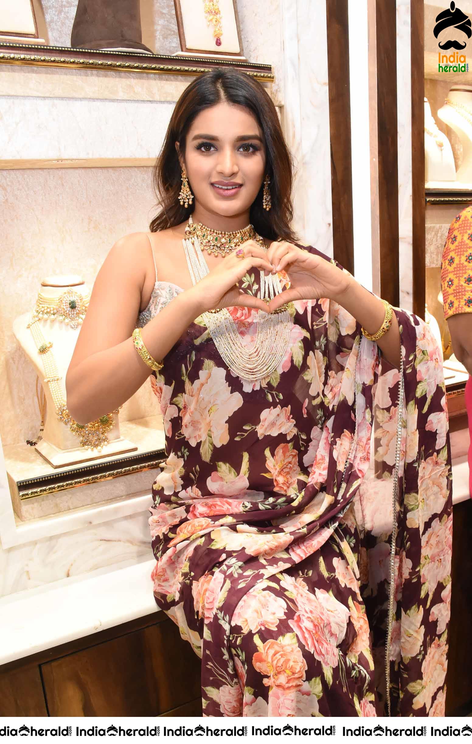 Hot Niddhi Agerwal in Saree Launches Manepally Jewellers 4th Branch at Dilsukhnagar Set 2