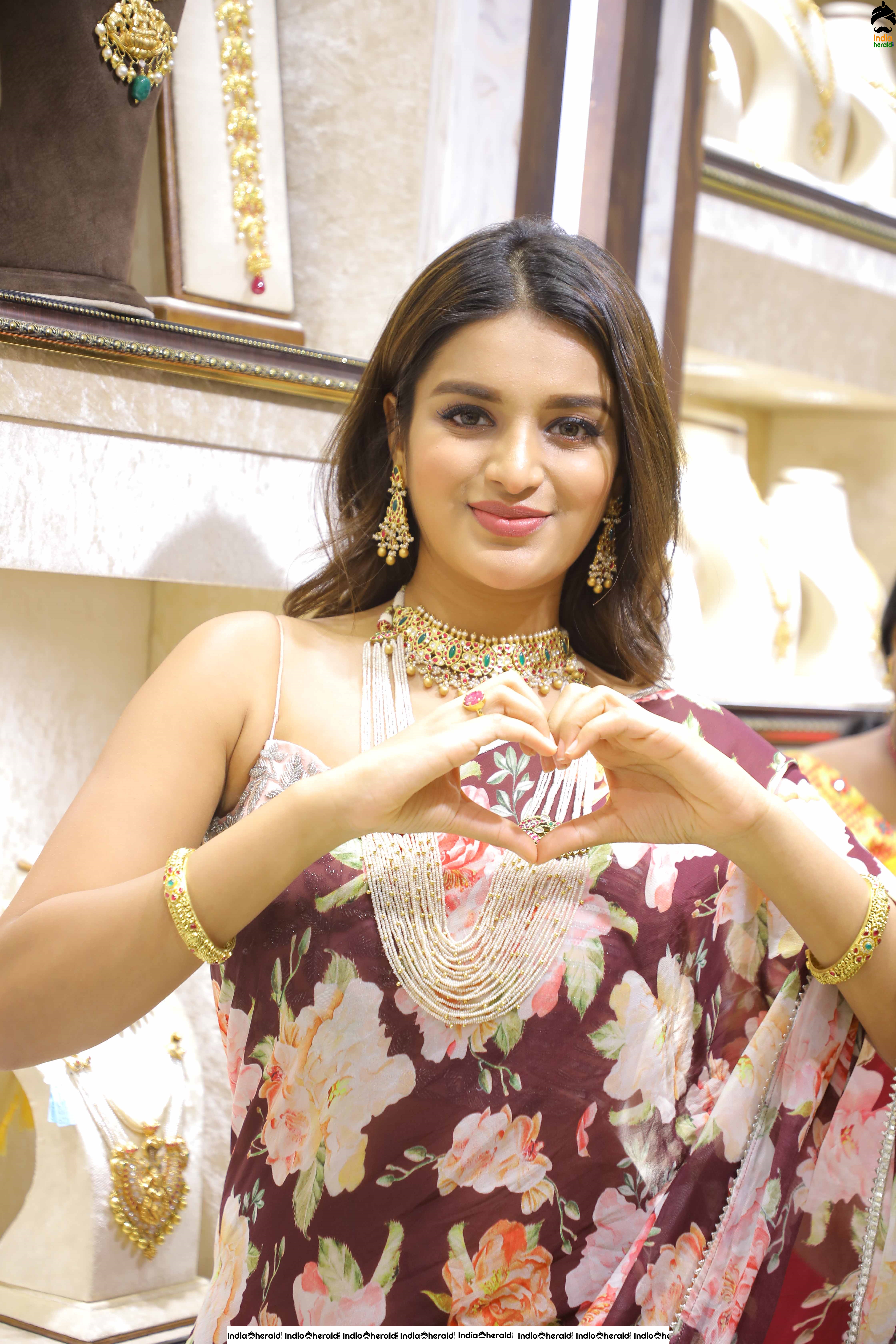 Hot Niddhi Agerwal in Saree Launches Manepally Jewellers 4th Branch at Dilsukhnagar Set 3