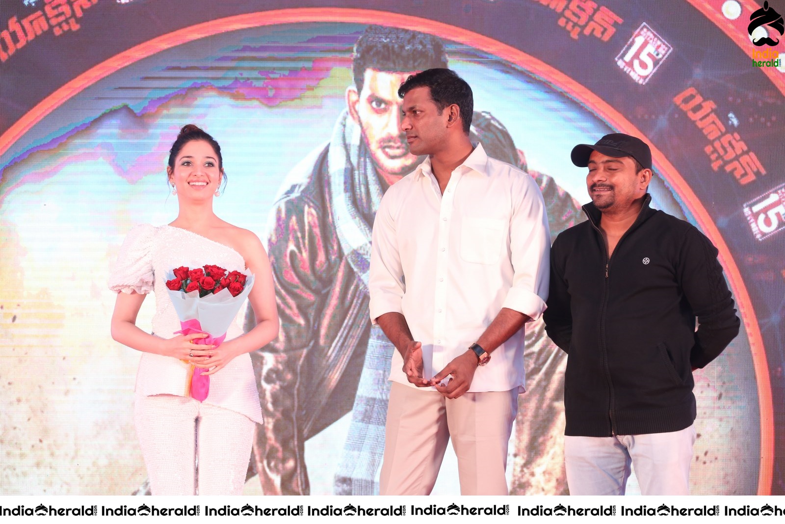 Hot Tamannaah in White close with Vishal at Action Throwback Event Set 3