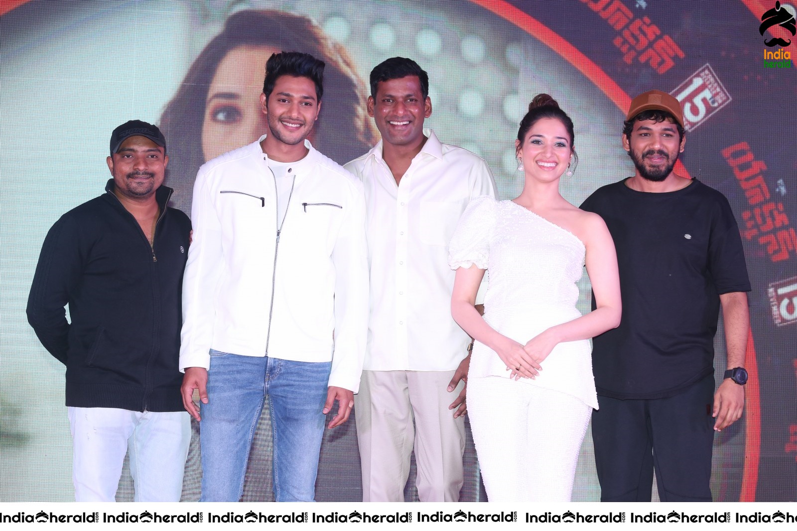 Hot Tamannaah in White close with Vishal at Action Throwback Event Set 4