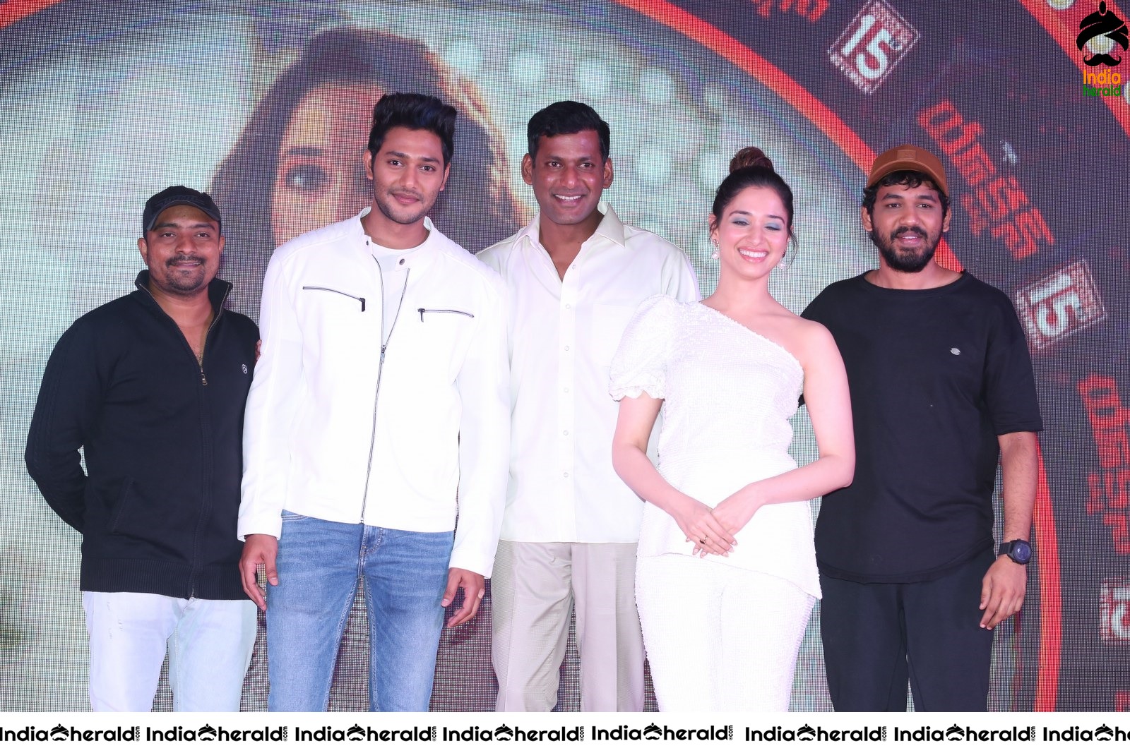 Hot Tamannaah in White close with Vishal at Action Throwback Event Set 4