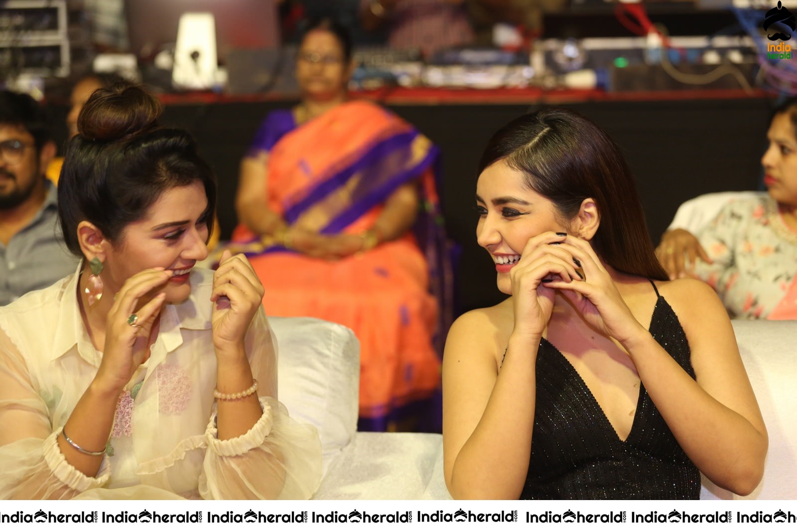 Payal Rajput and Raashi Khanna share a happy moment at Venky Mama Event