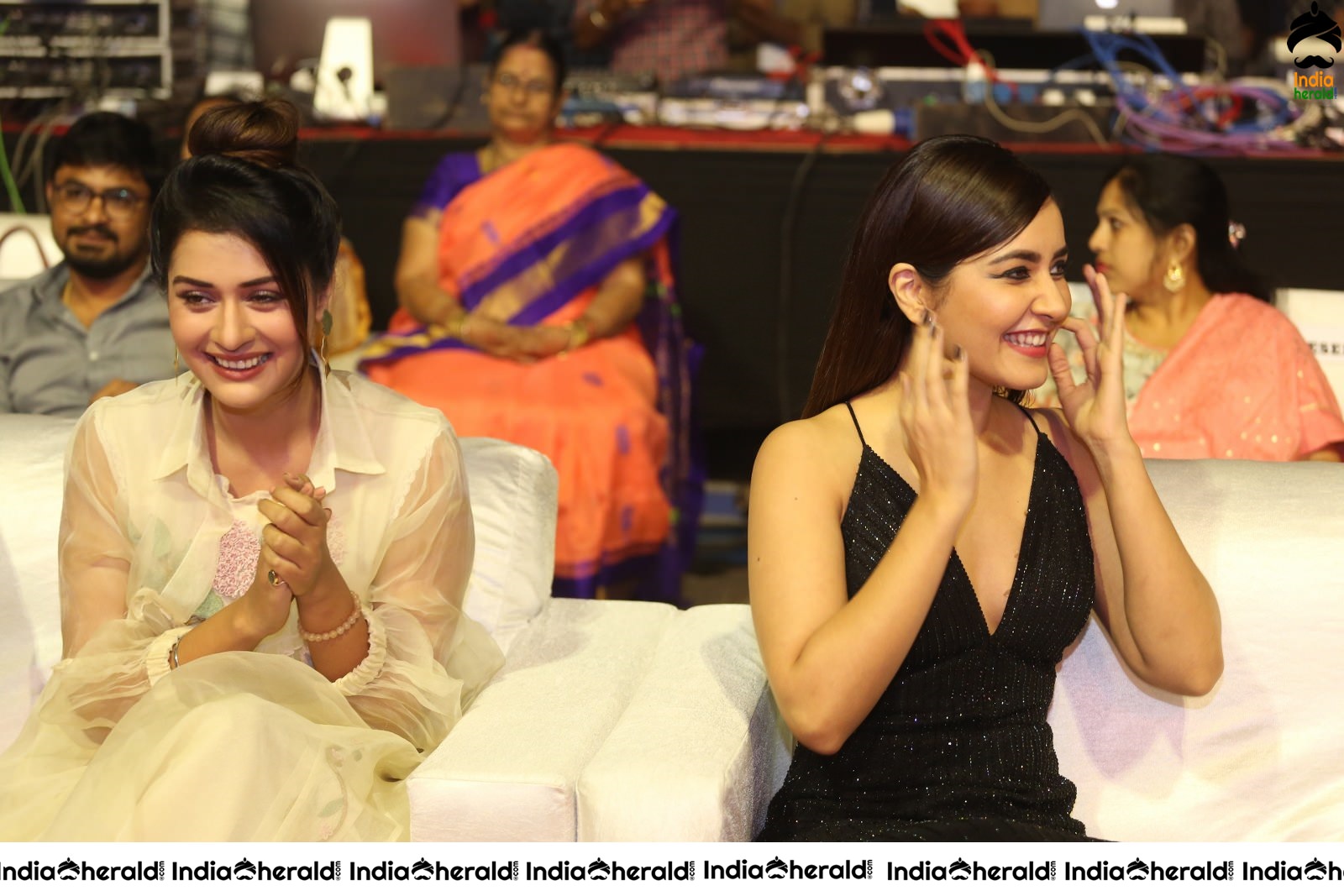 Payal Rajput and Raashi Khanna share a happy moment at Venky Mama Event