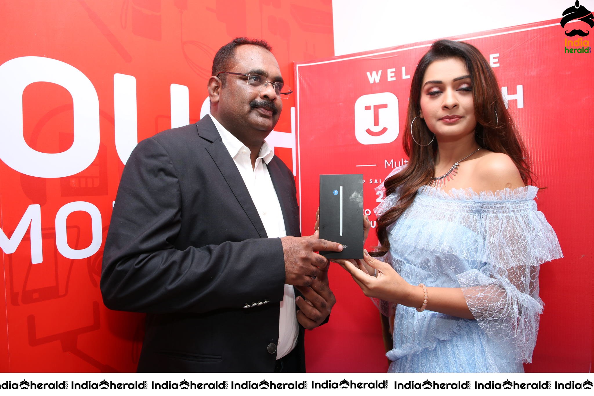 Payal Rajput with Grand Touch Mobiles Store Launch Manager