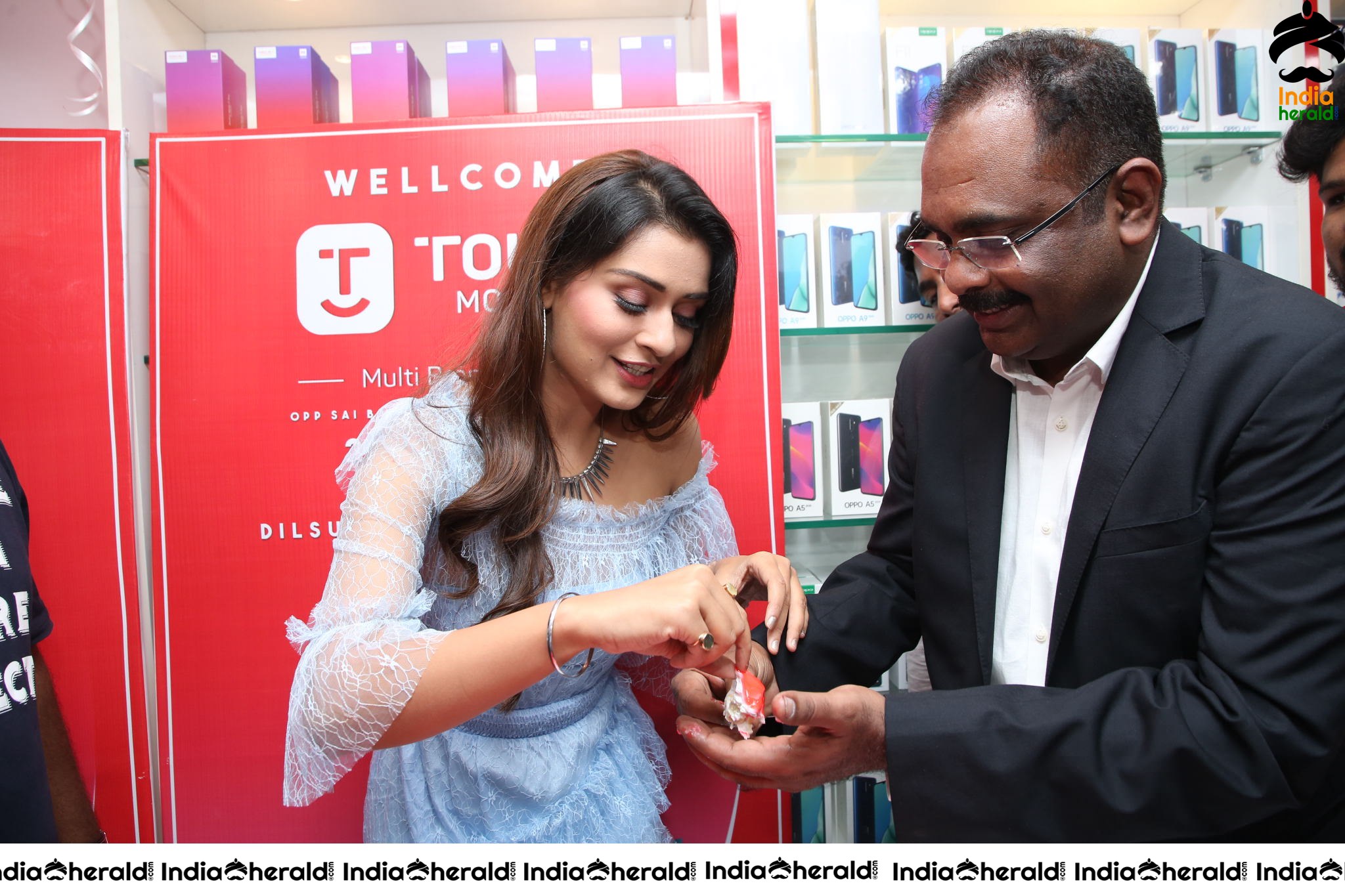 Payal Rajput with Grand Touch Mobiles Store Launch Manager