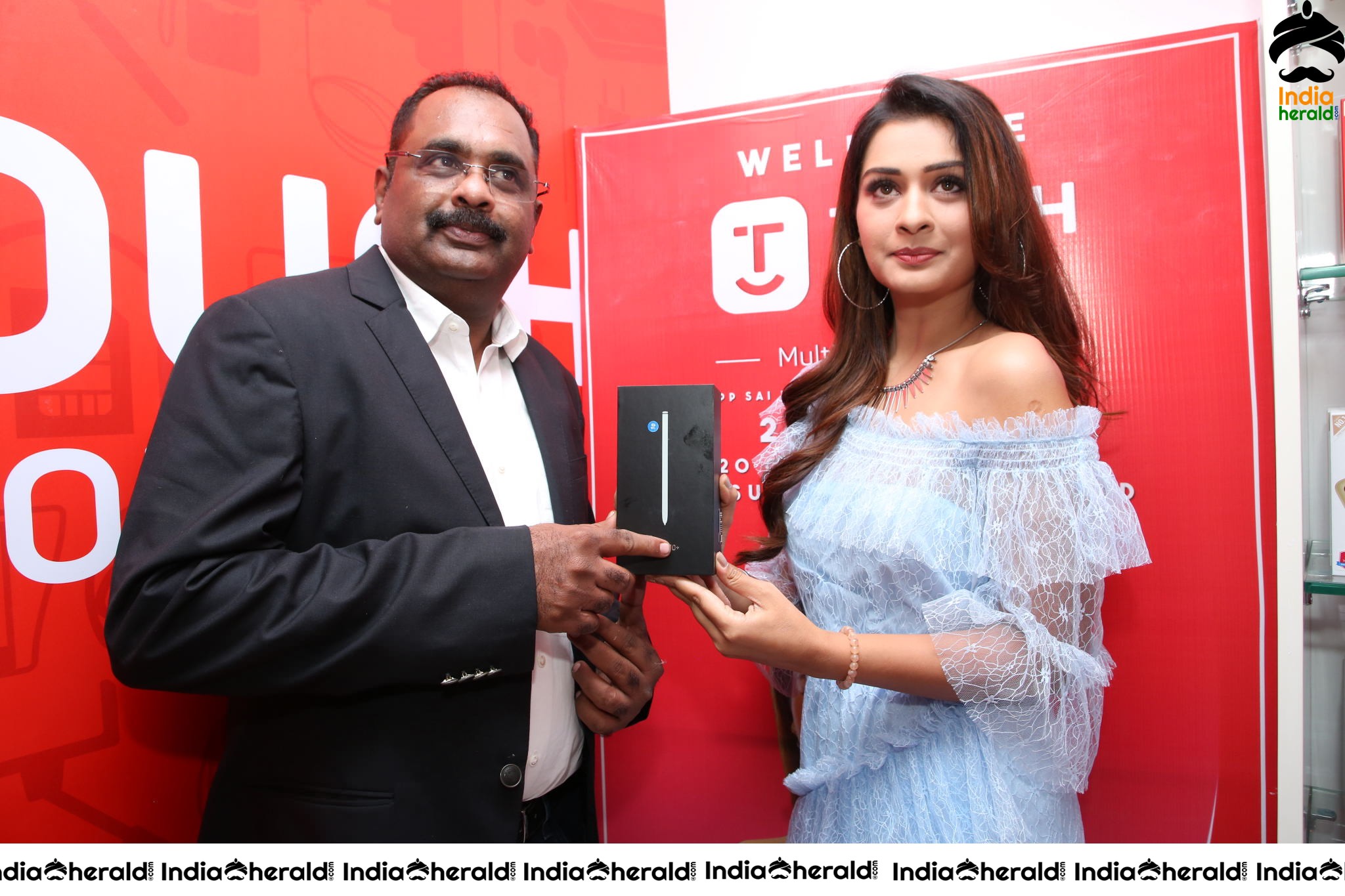 Payal Rajput with Grand Touch Mobiles Store Launch Manager