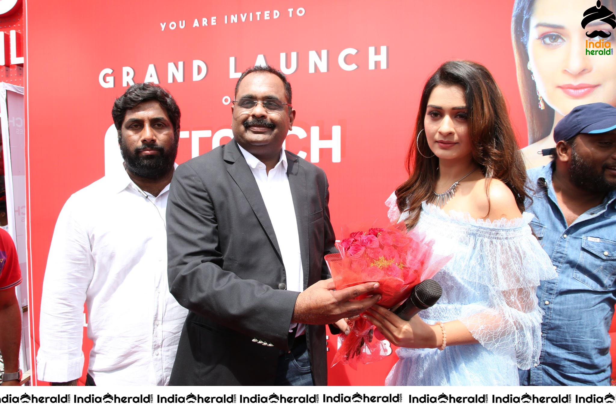 Payal Rajput with Grand Touch Mobiles Store Launch Manager