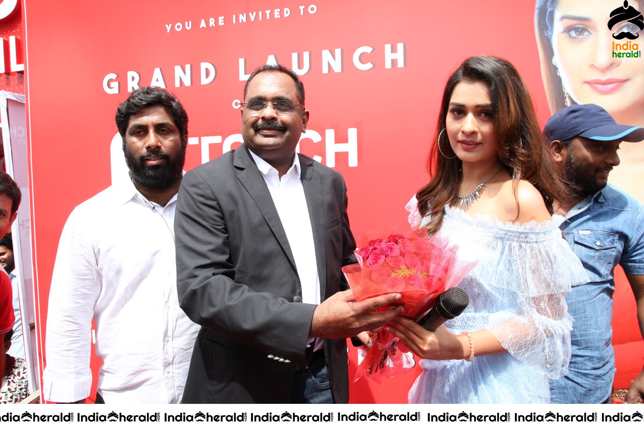Payal Rajput with Grand Touch Mobiles Store Launch Manager