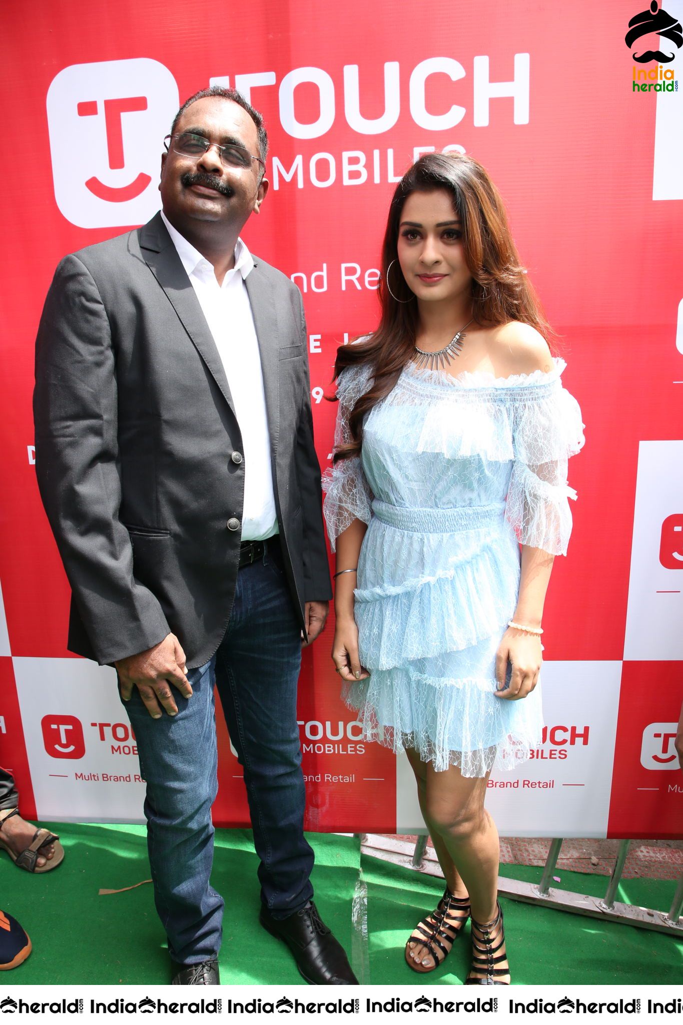 Payal Rajput with Grand Touch Mobiles Store Launch Manager