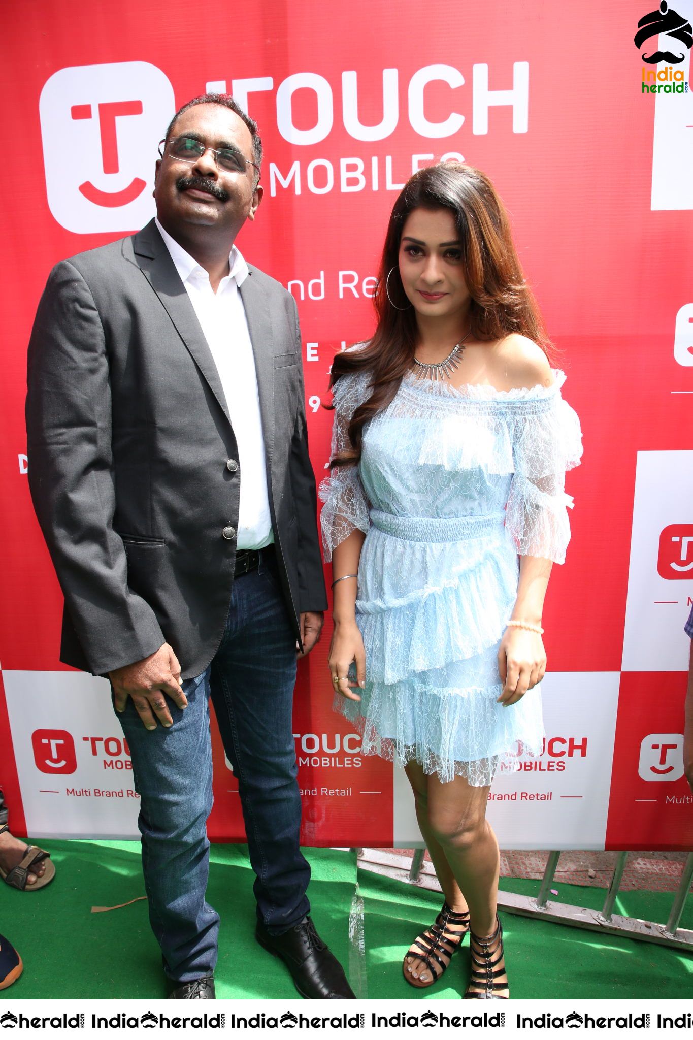 Payal Rajput with Grand Touch Mobiles Store Launch Manager