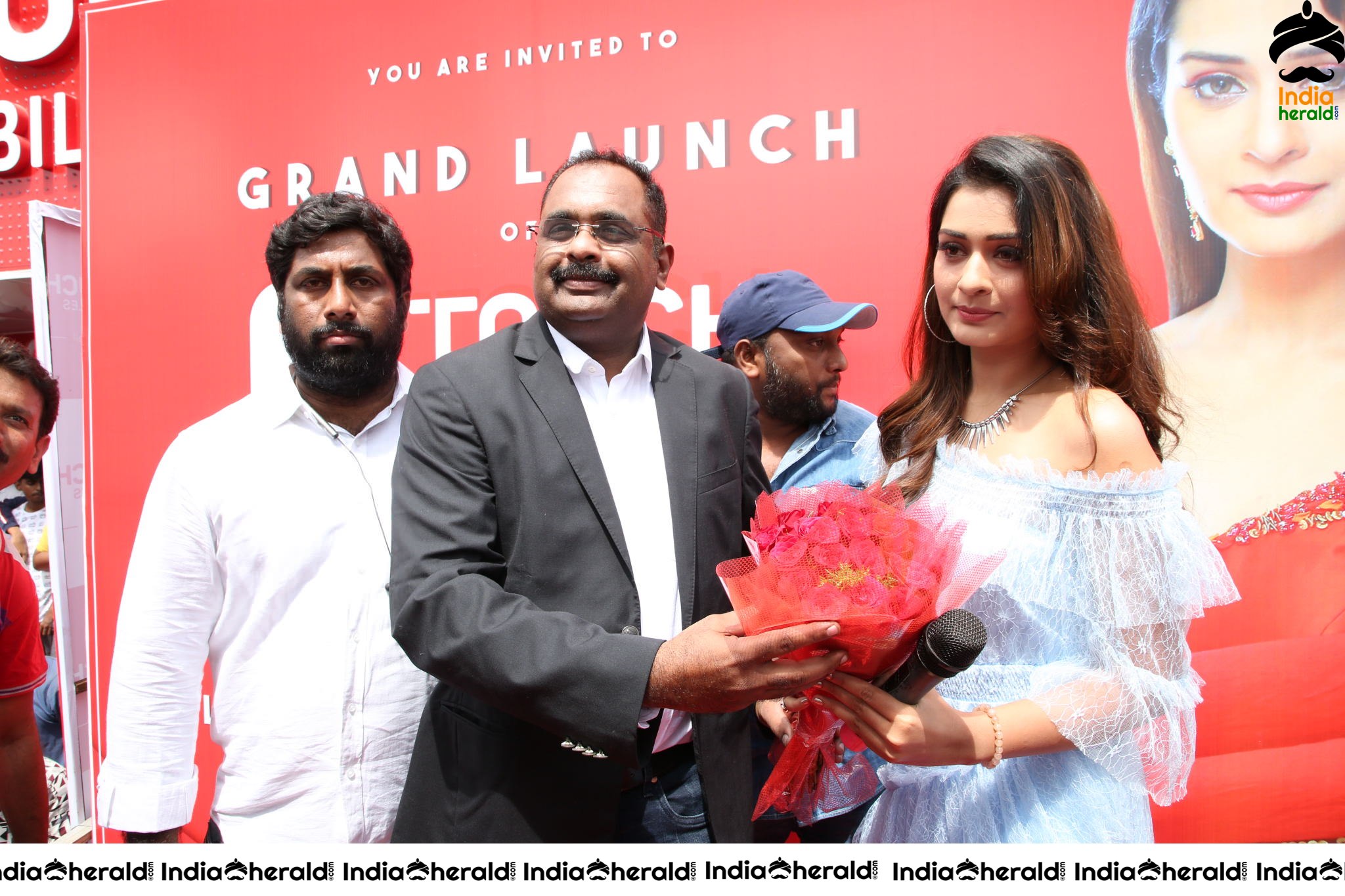 Payal Rajput with Grand Touch Mobiles Store Launch Manager