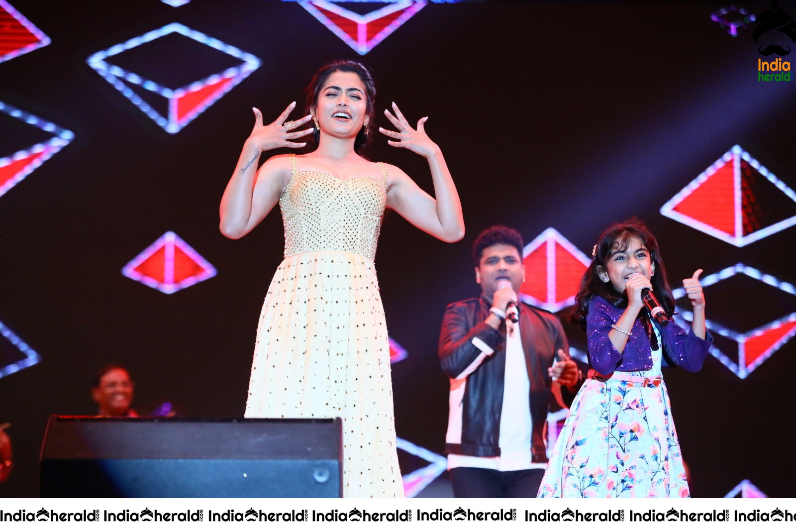 Rashmika Mandanna Cute and Adorable Moments with Kid on the stage at SN Event Set 4