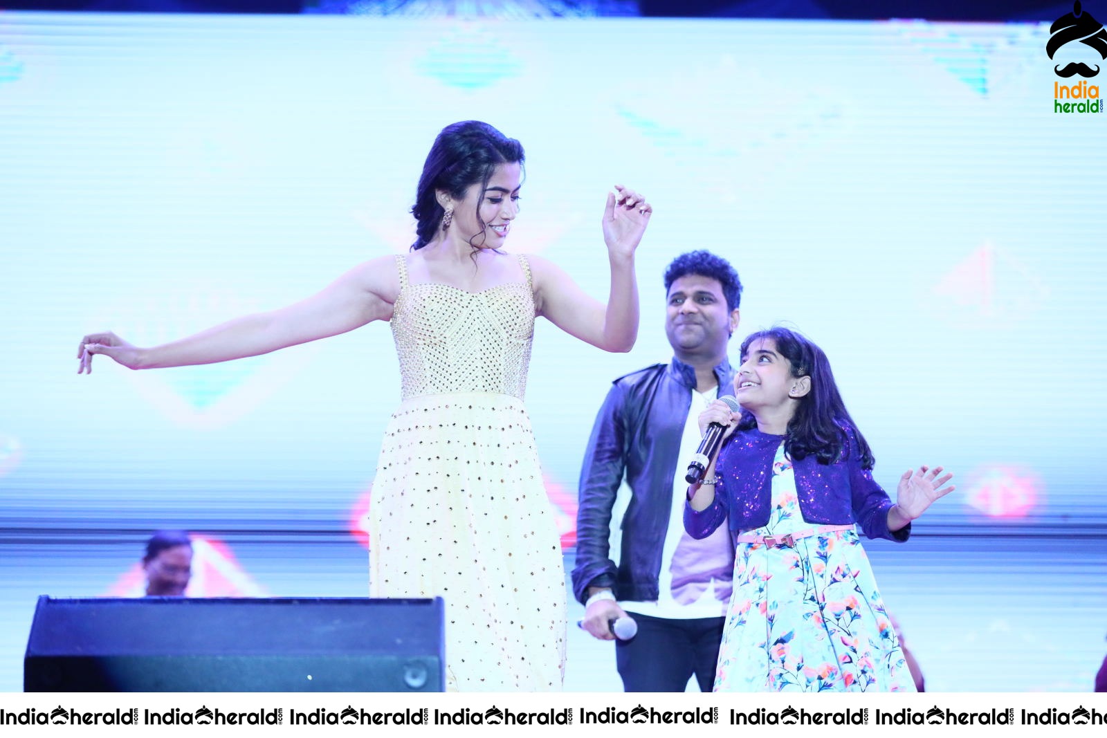 Rashmika Mandanna Cute and Adorable Moments with Kid on the stage at SN Event Set 4