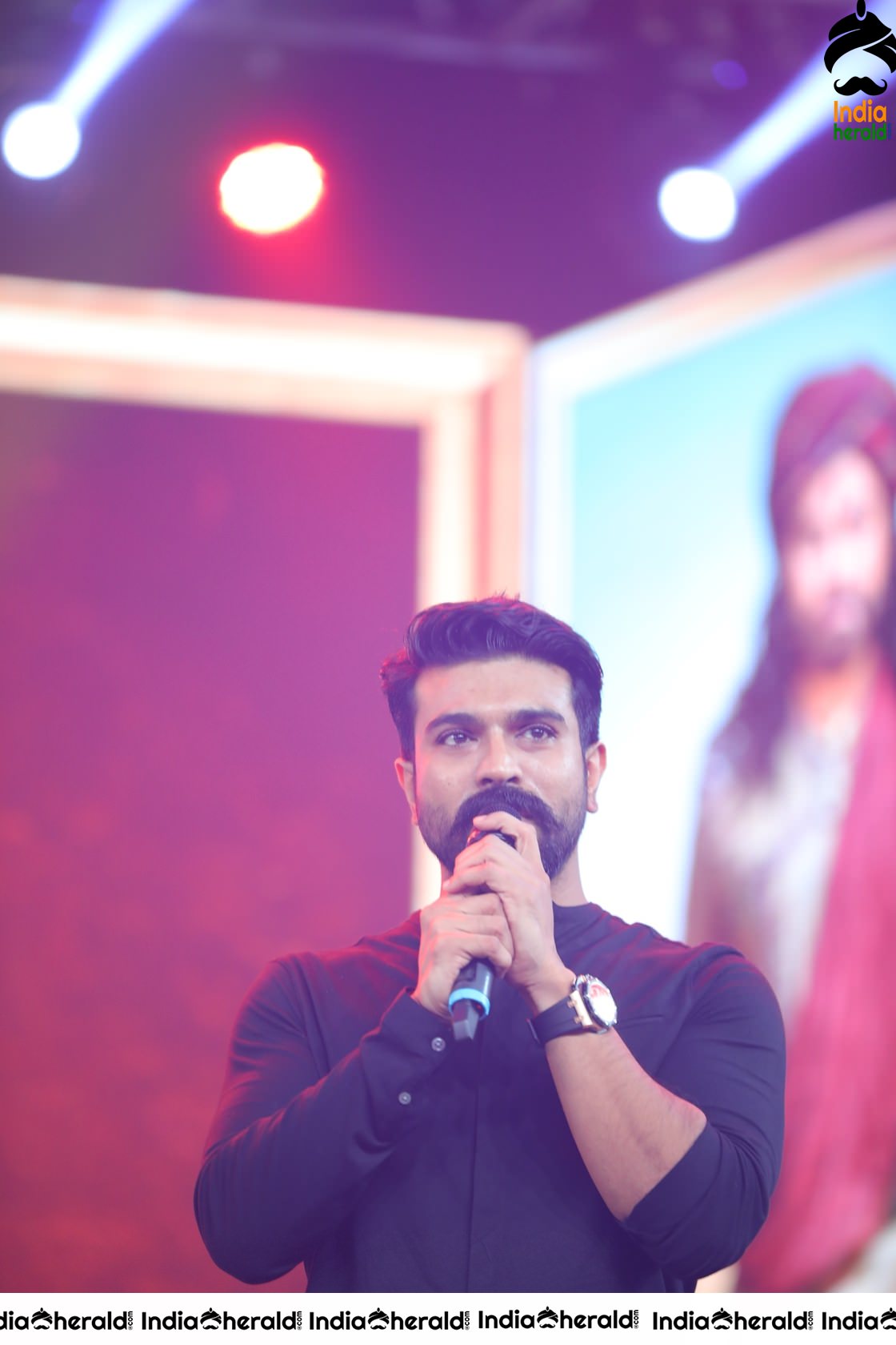 Unseen Candid Clicks of Ram Charan On the stage Set 1