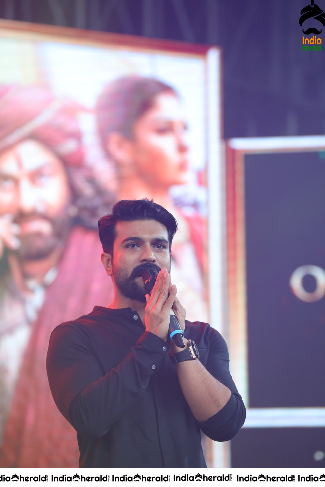 Unseen Candid Clicks of Ram Charan On the stage Set 1