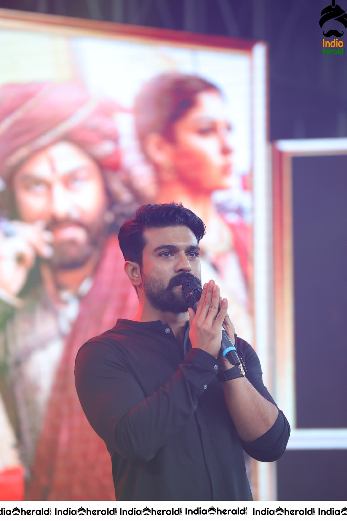 Unseen Candid Clicks of Ram Charan On the stage Set 1