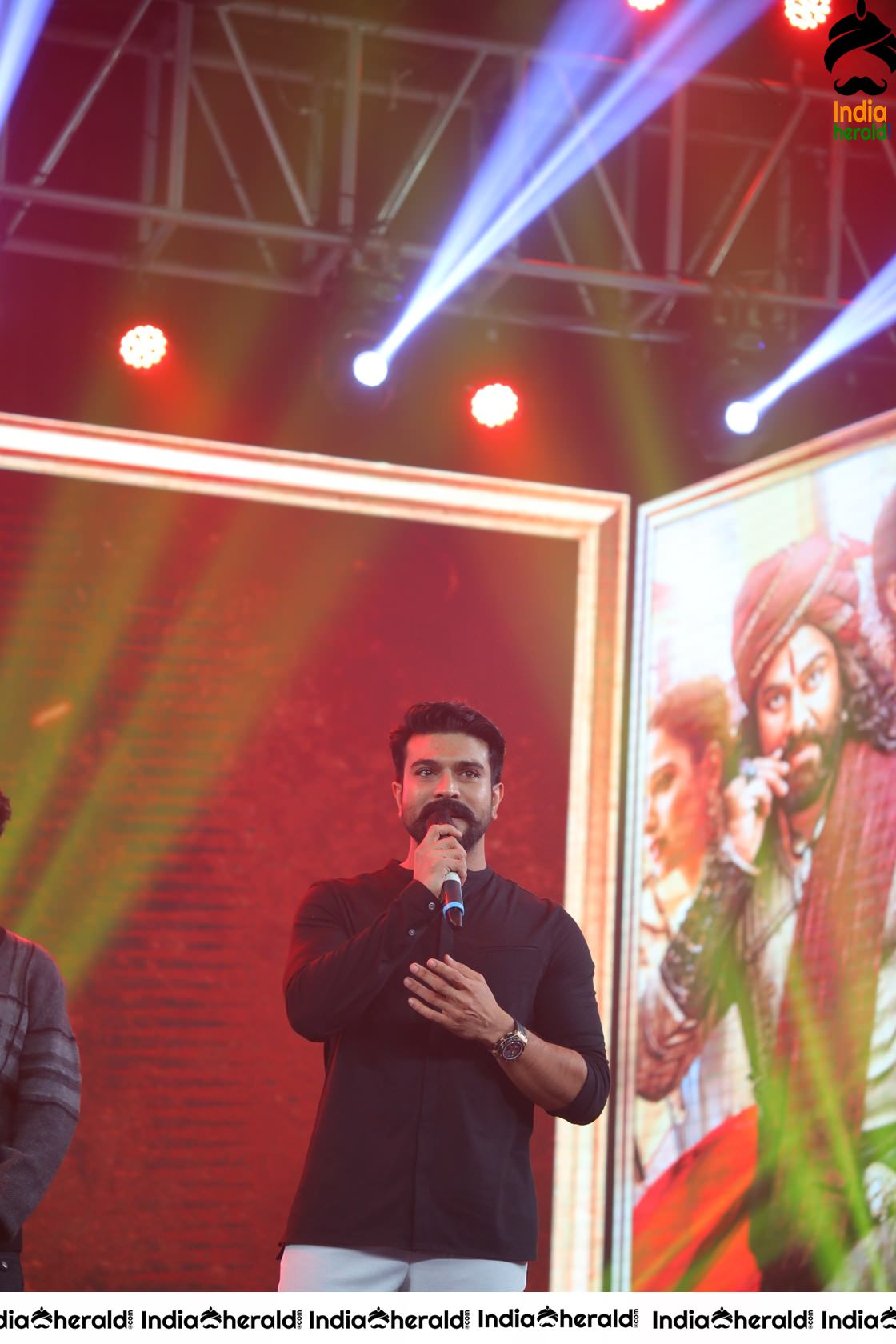 Unseen Candid Clicks of Ram Charan On the stage Set 1