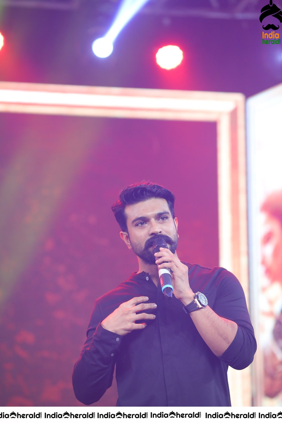 Unseen Candid Clicks of Ram Charan On the stage Set 1