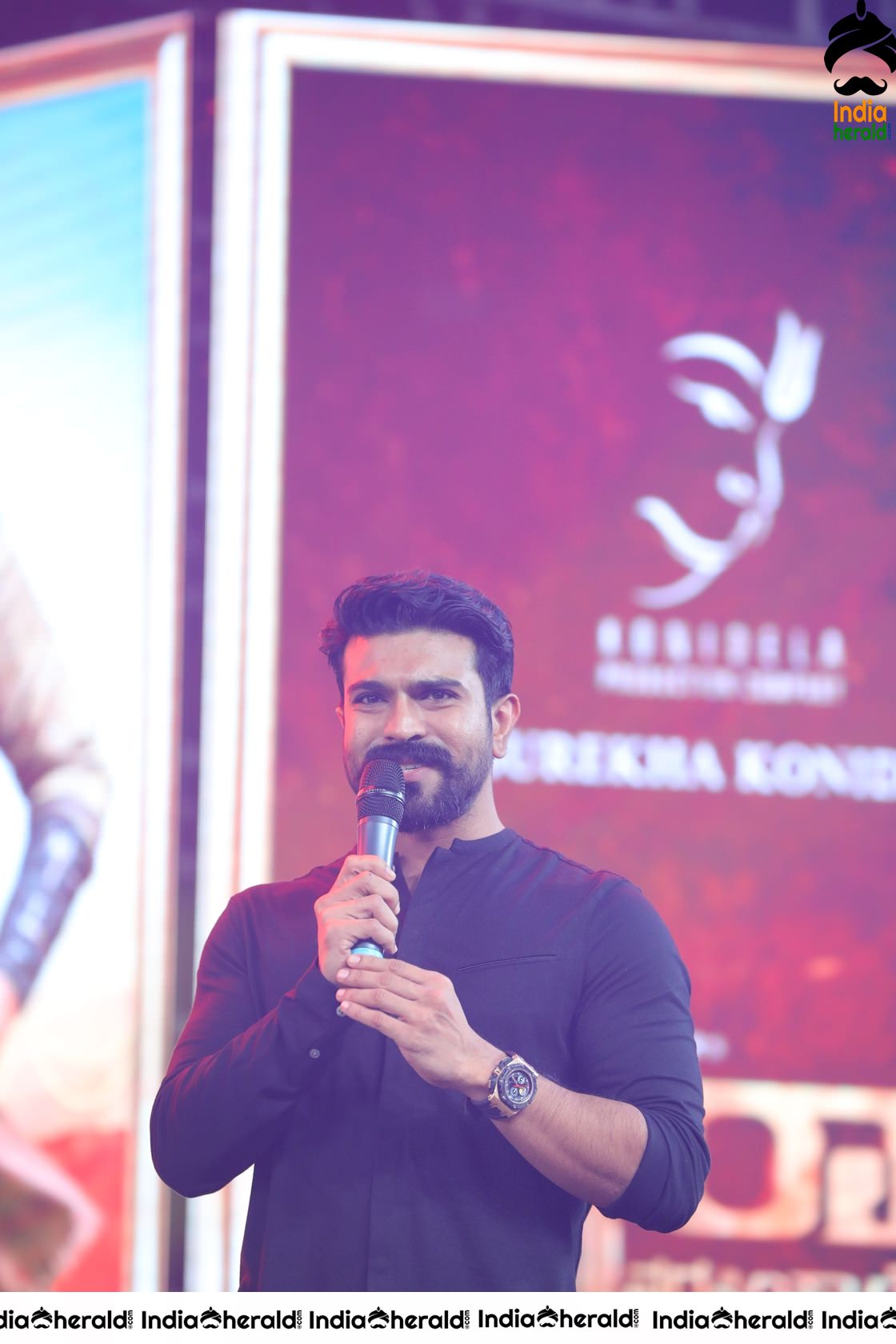 Unseen Candid Clicks of Ram Charan On the stage Set 1