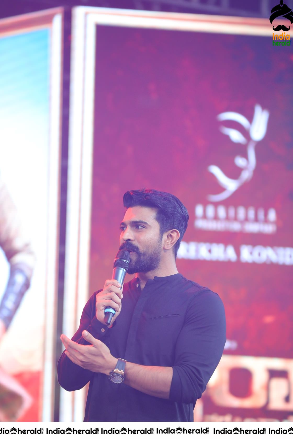 Unseen Candid Clicks of Ram Charan On the stage Set 1