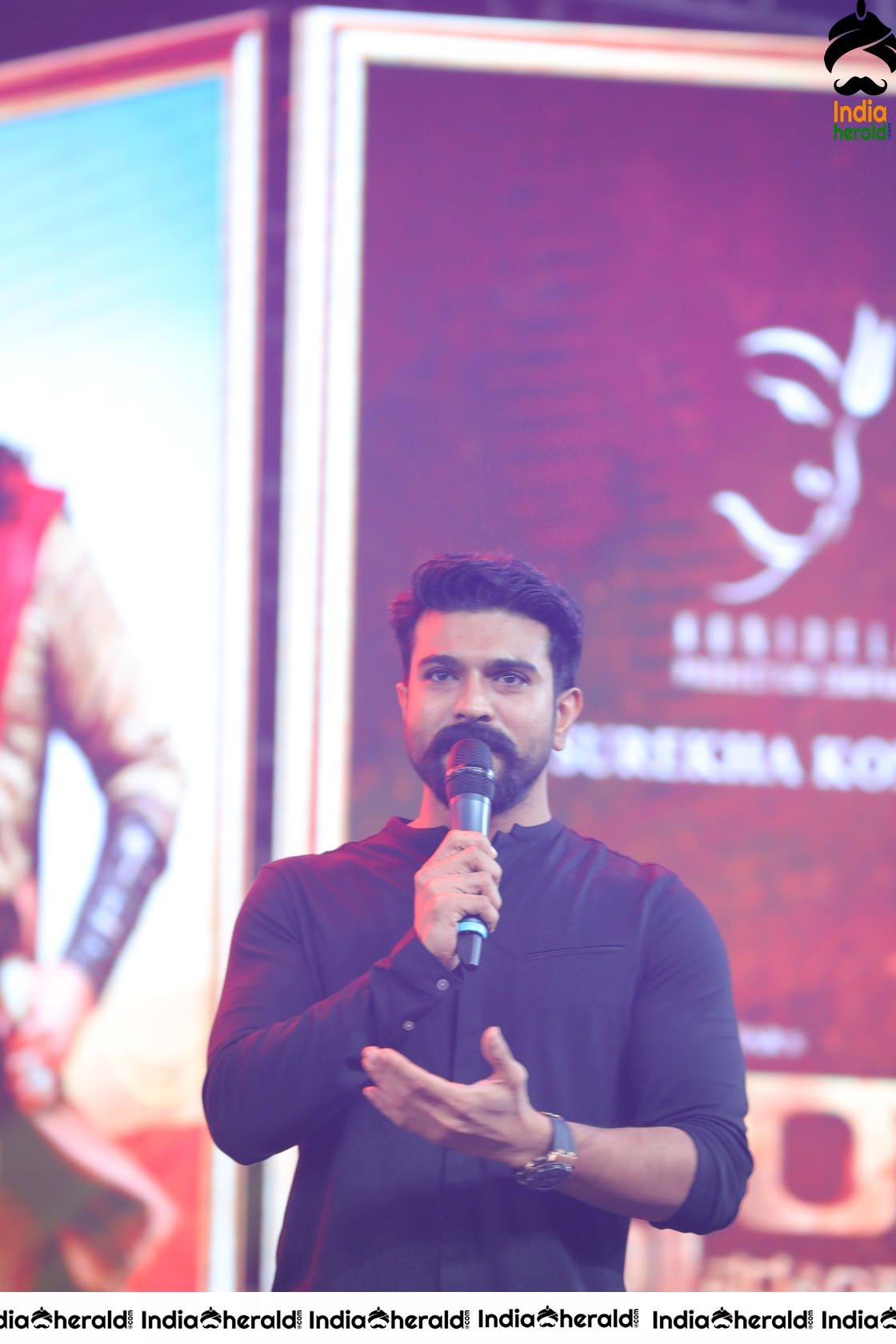 Unseen Candid Clicks of Ram Charan On the stage Set 1