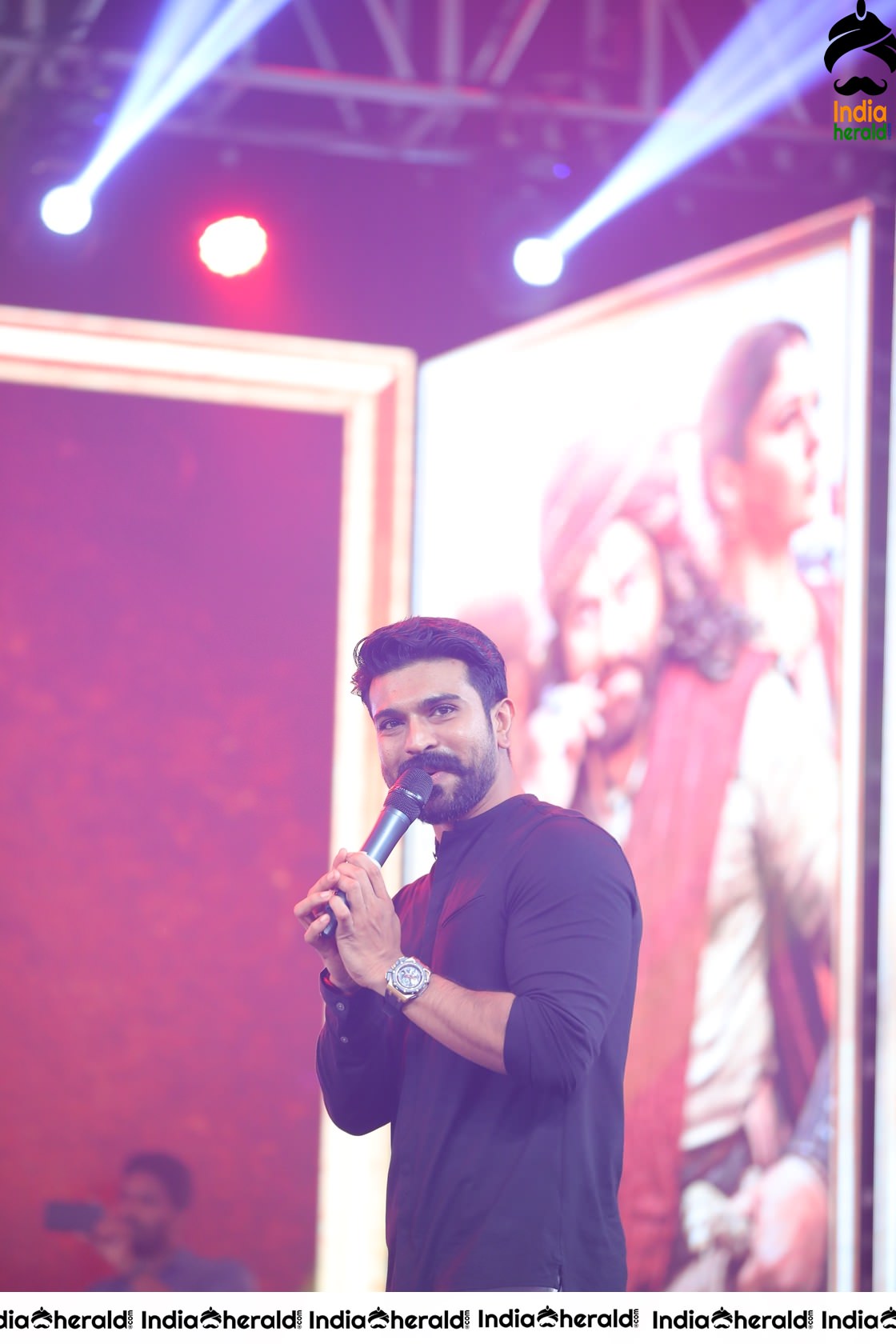 Unseen Candid Clicks of Ram Charan On the stage Set 2