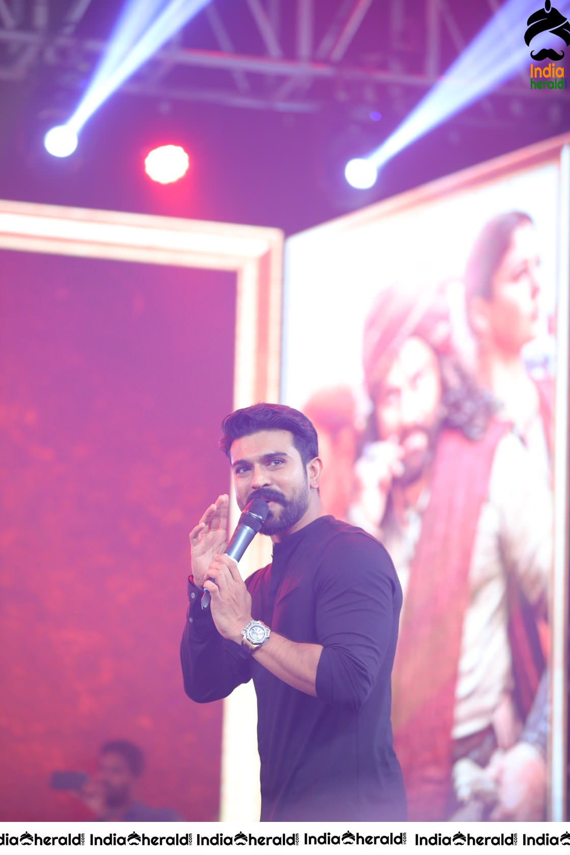 Unseen Candid Clicks of Ram Charan On the stage Set 2