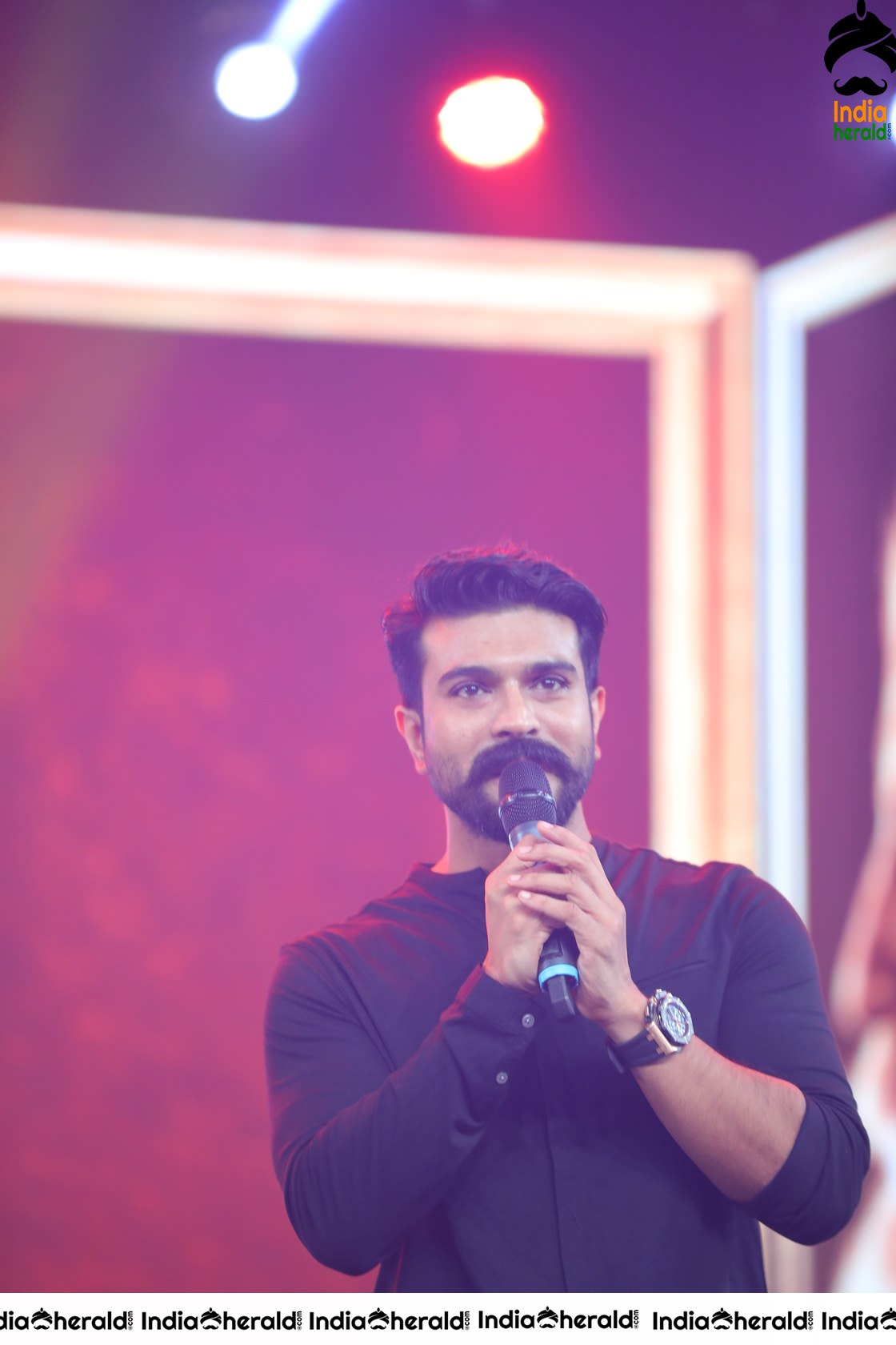 Unseen Candid Clicks of Ram Charan On the stage Set 2