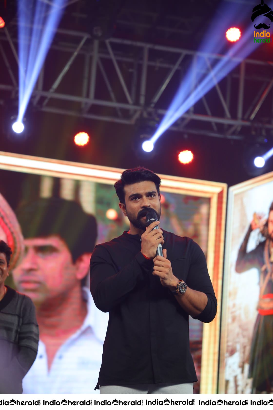 Unseen Candid Clicks of Ram Charan On the stage Set 2