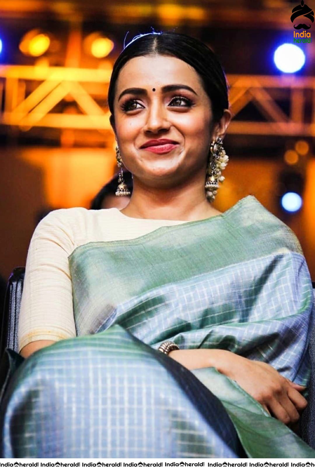 Trisha looking like a Newly Married House Wife with Saree and Jasmine Flowers