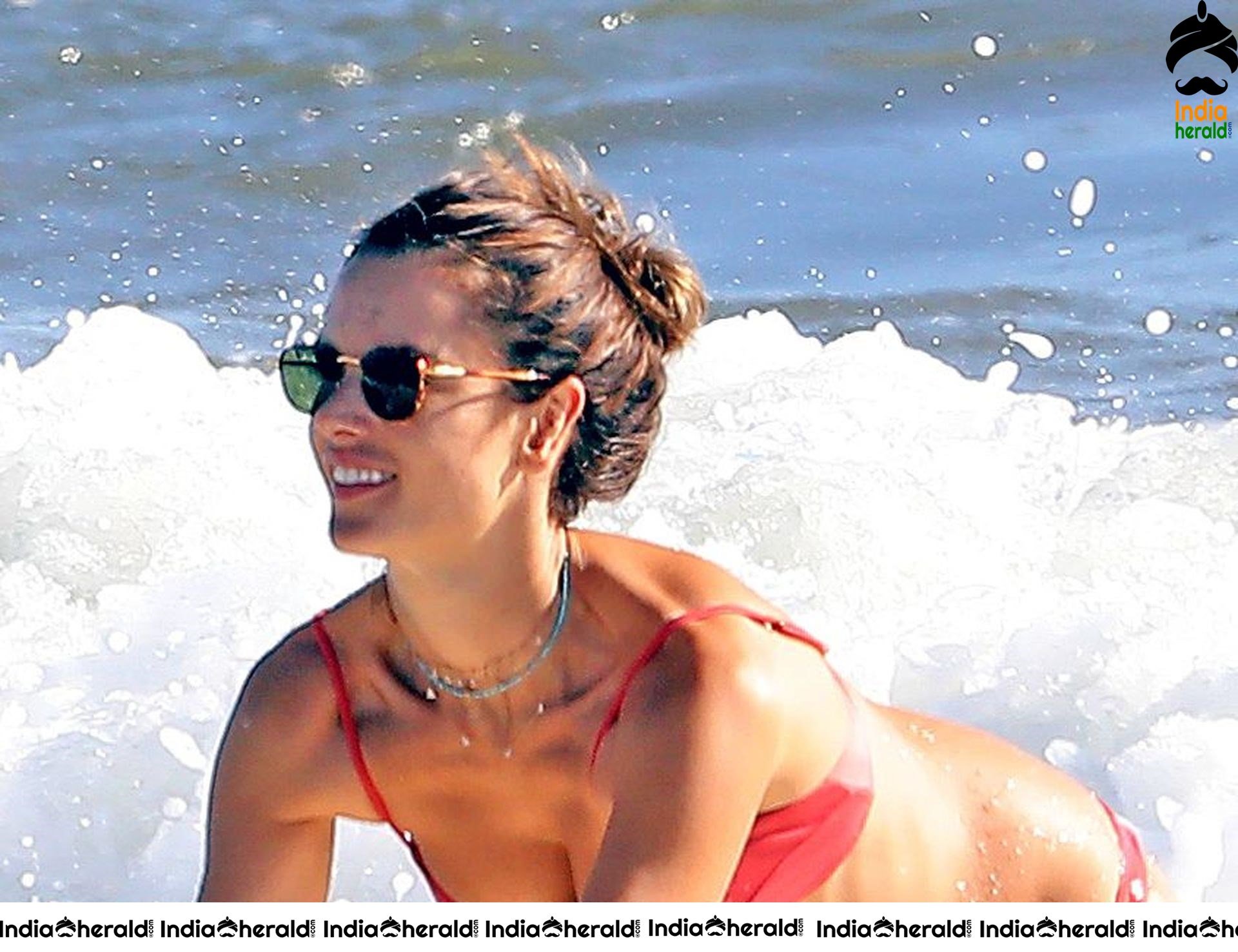 Alessandra Ambrosio Caught in Bikini while getting wet on the Beach