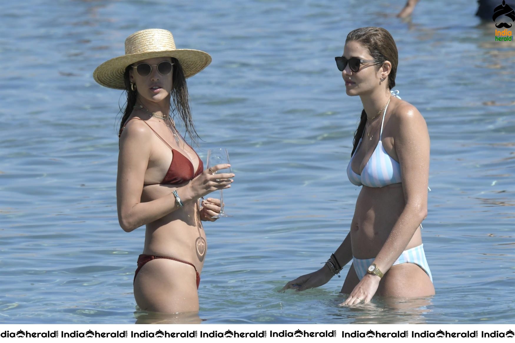 Alessandra Ambrosio Exposing Too Much in String Bikini on the beach in Mykonos Set 1