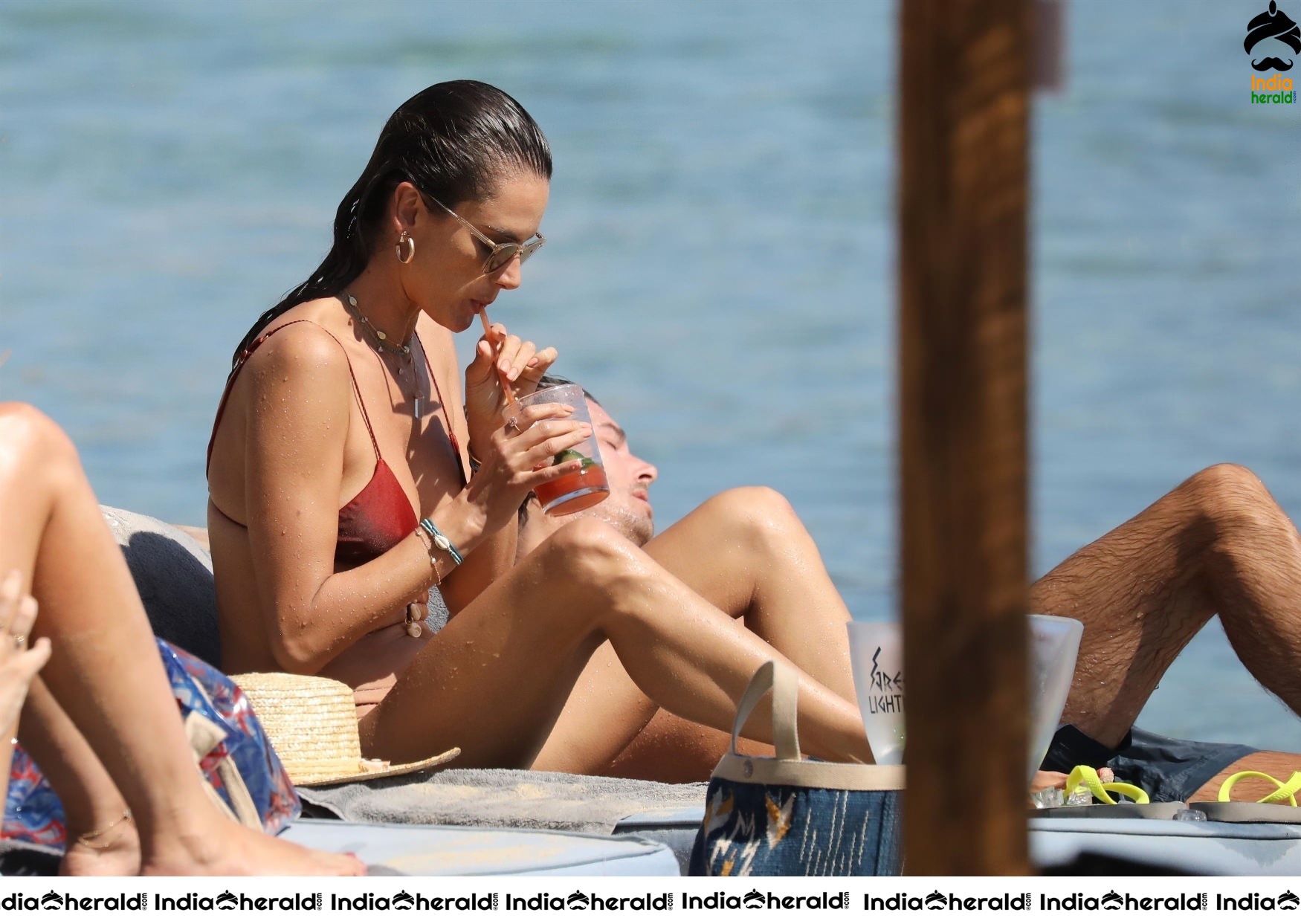 Alessandra Ambrosio Exposing Too Much in String Bikini on the beach in Mykonos Set 1