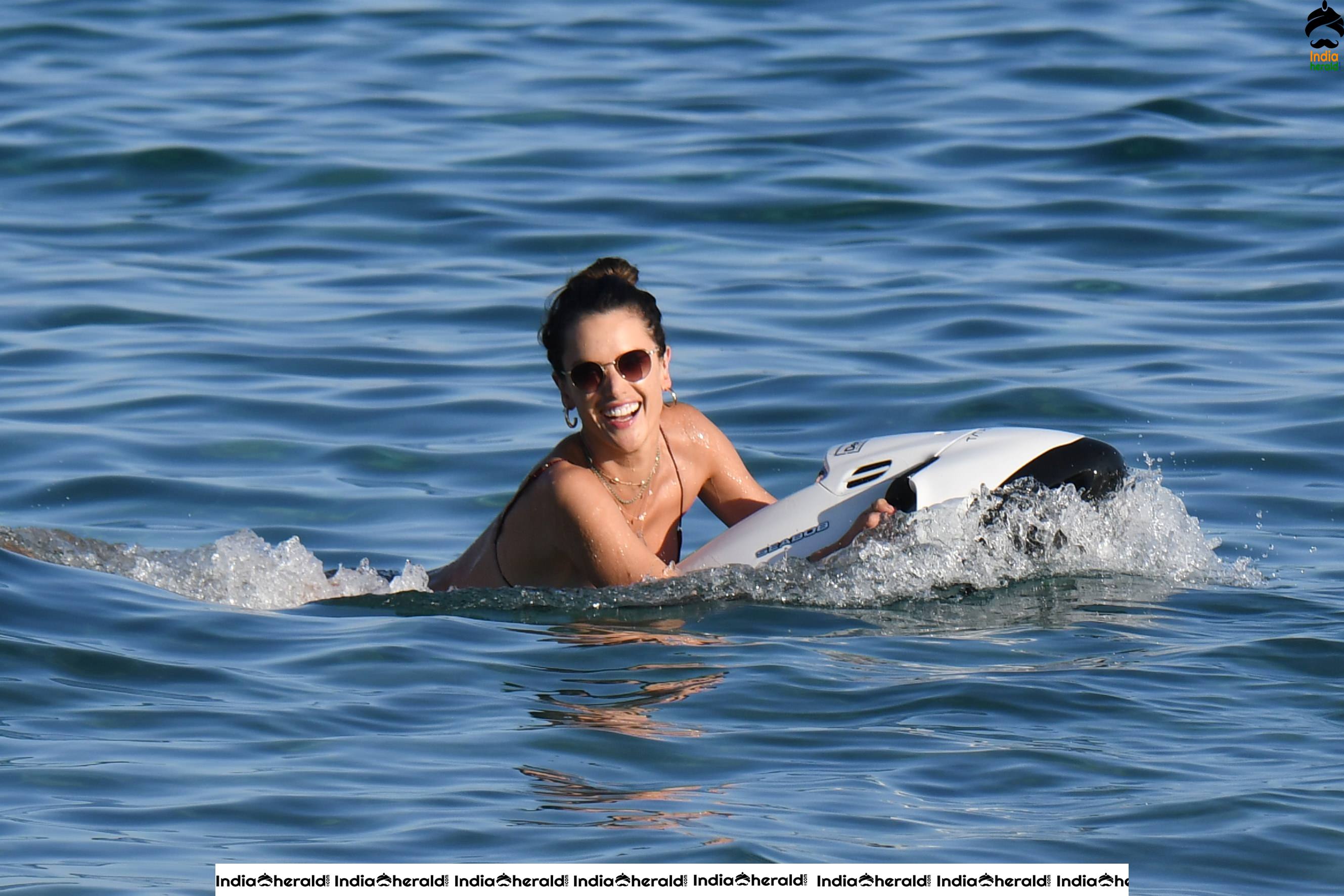 Alessandra Ambrosio Exposing Too Much in String Bikini on the beach in Mykonos Set 3