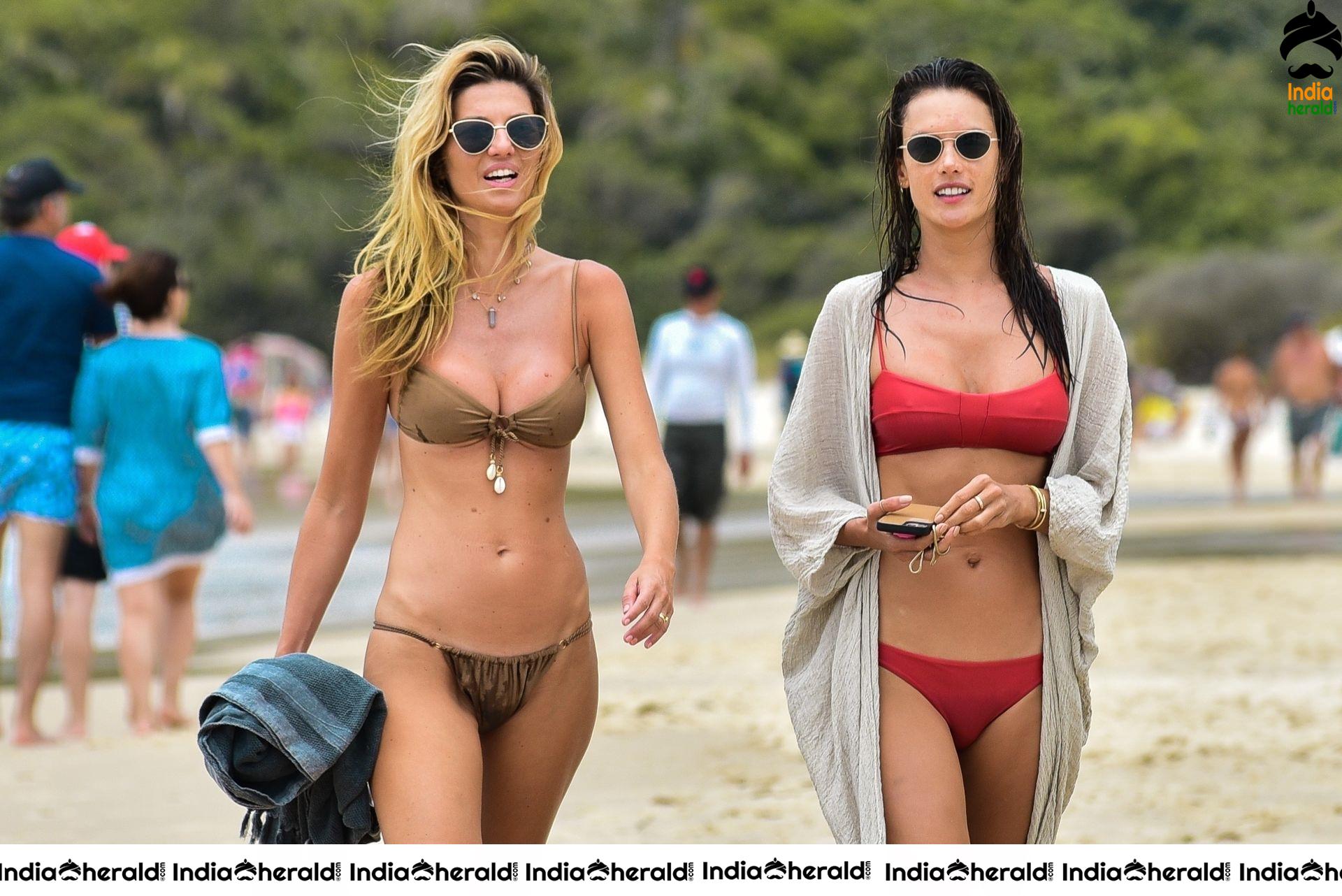 Alessandra Ambrosio in a red bikini at the beach in Florianopolis