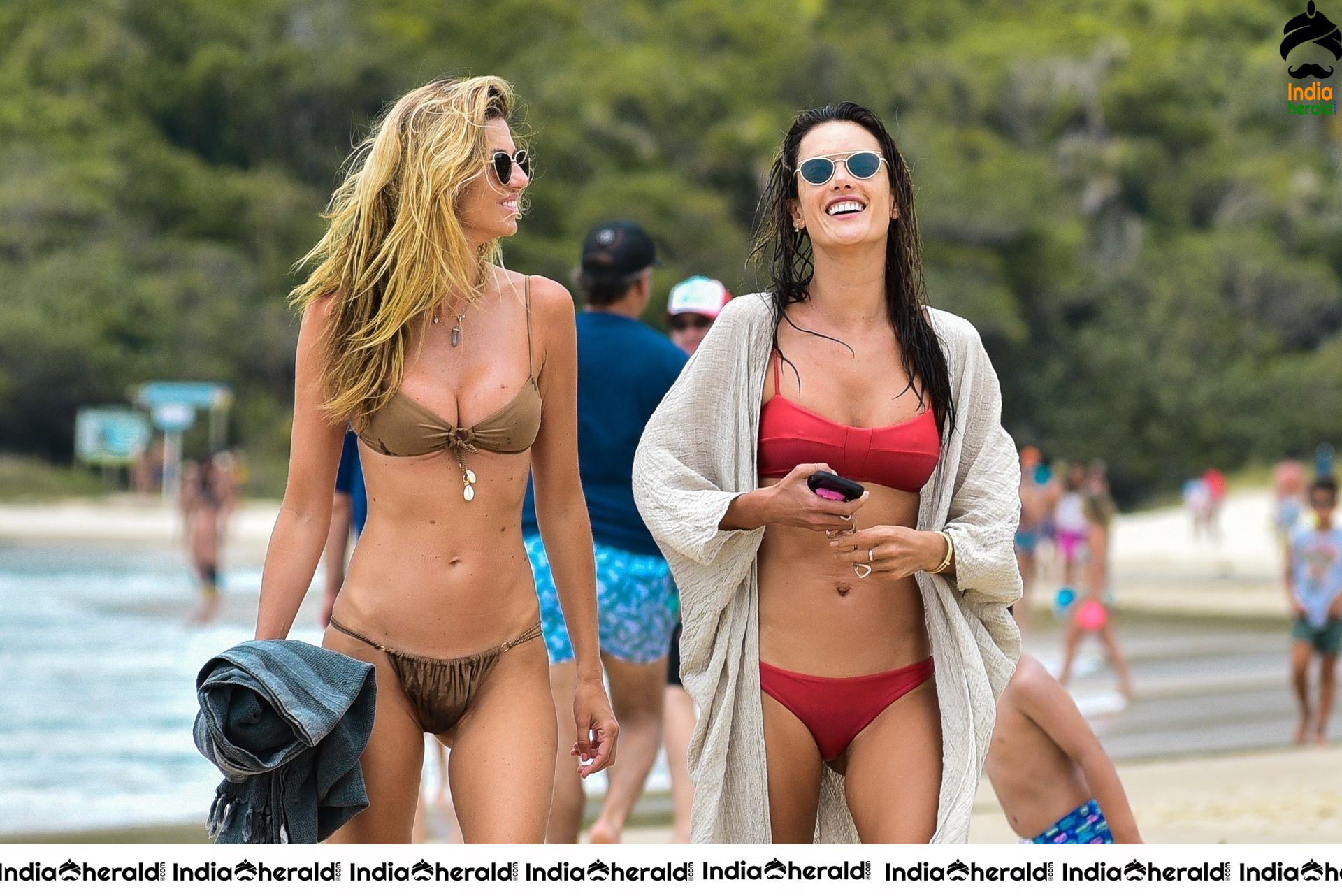 Alessandra Ambrosio in a red bikini at the beach in Florianopolis